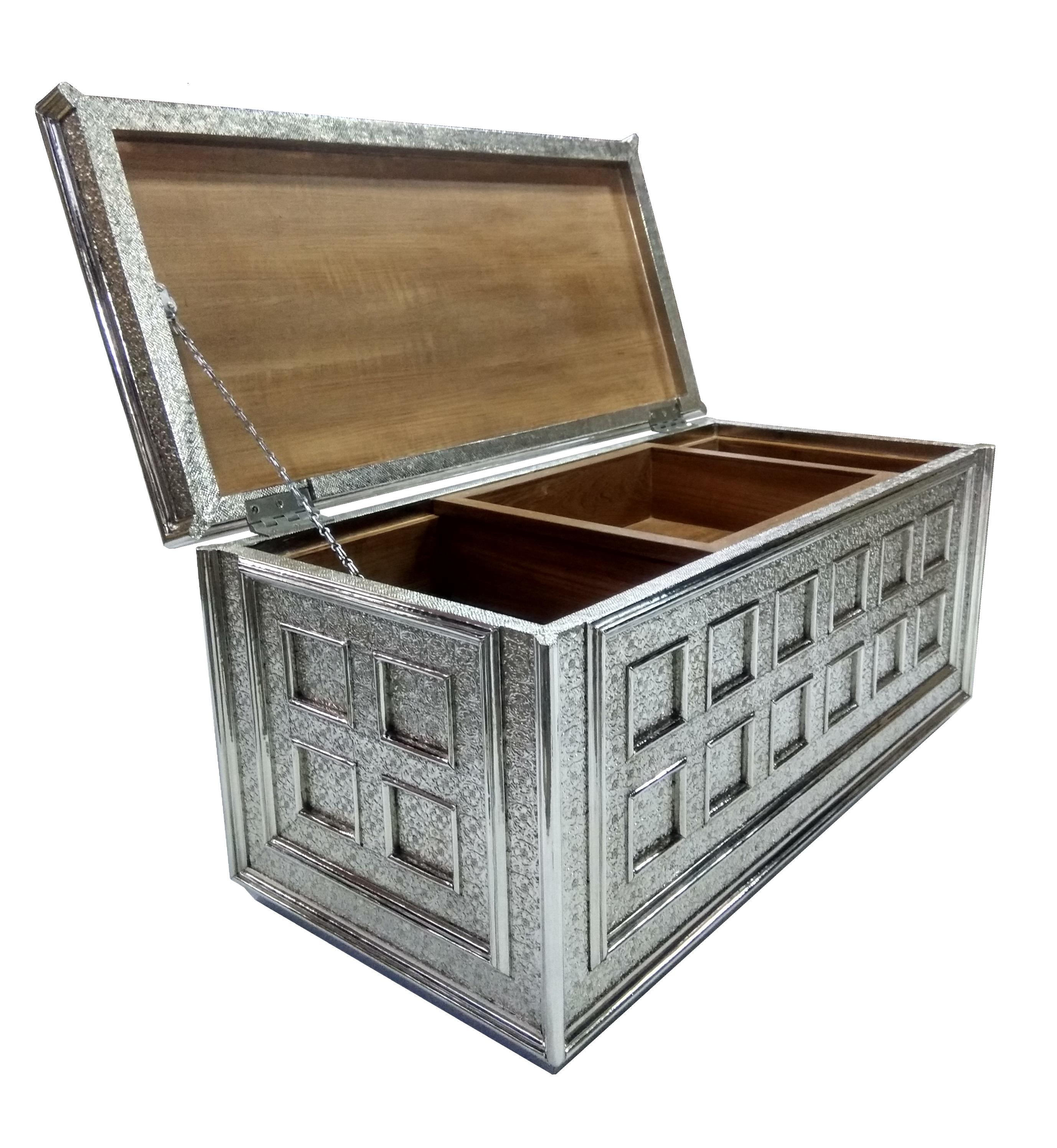 Inspired by the classic coffered, hand-tooled metal-clad furniture of the opulent Mughal period. This elegant furniture is hand made from solid pieces of teak that are joined into a repeating pattern of panels enclosed by raised moldings. Pattern