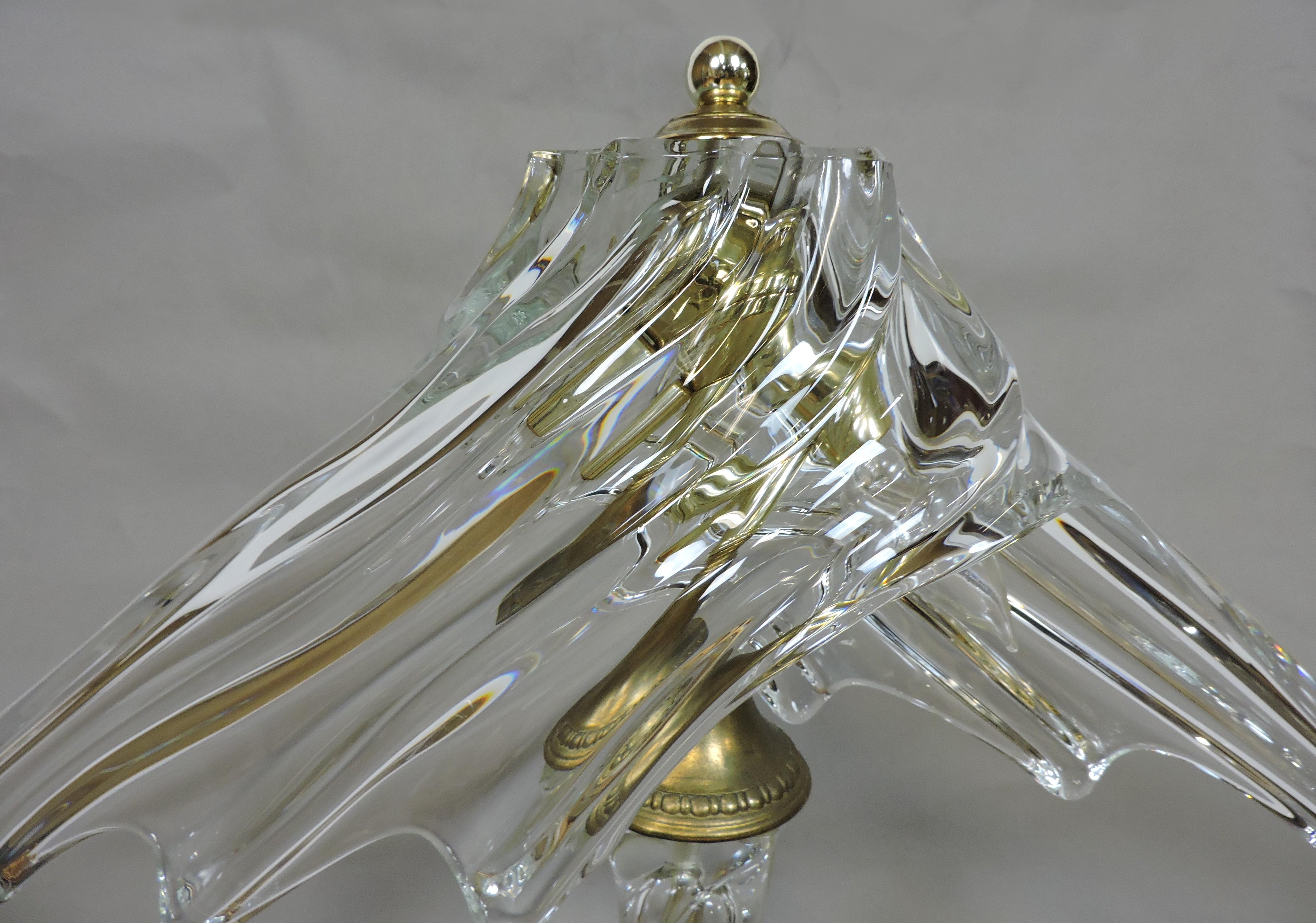 Glamorous hand blown crystal lamp by Cofrac Art Verrier France. This heavy and impressive sized lamp has a fluid, freeform shaped shade and base, and is beautiful when lit. It takes two candelabra bulbs and has an inline on/off switch.
 