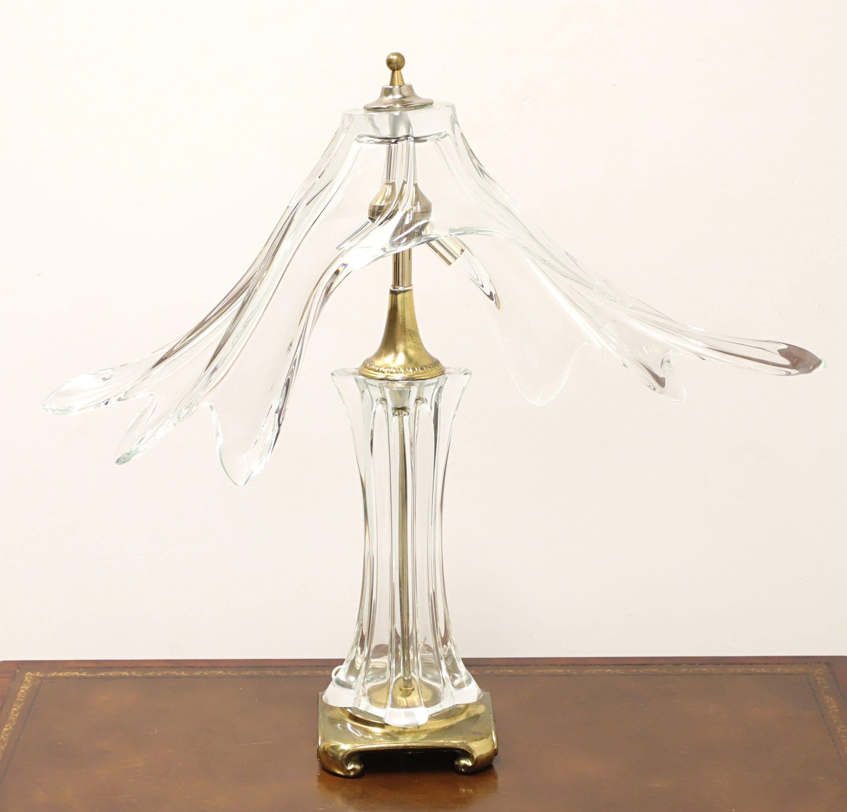 An Art Deco style table lamp in brass and uniquely shaped beautifully blown crystal. Presumed to be Cofrac Art Verrier from France. This piece is not signed; Cofrac used labels to identify their pieces which were usually removed by the purchasers