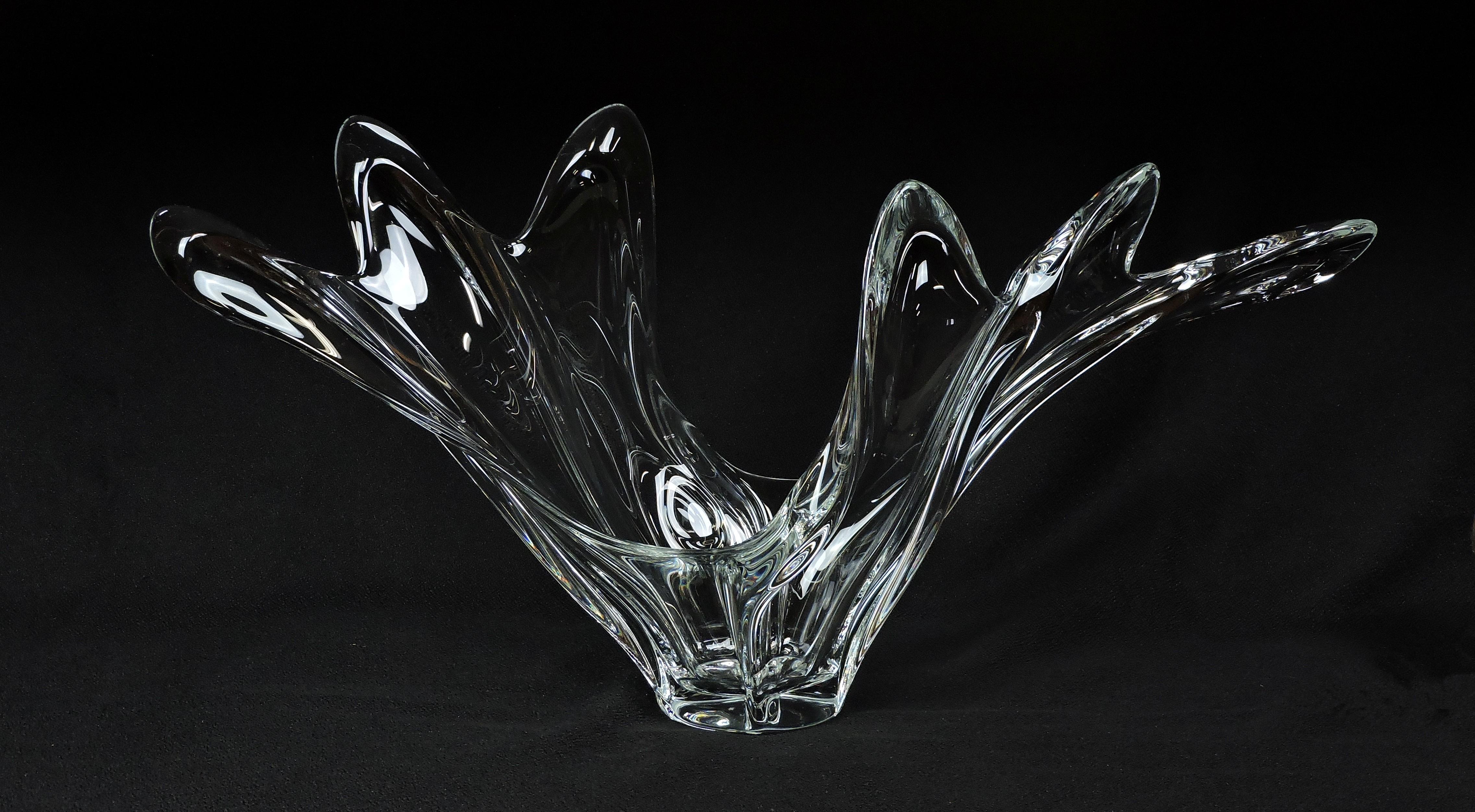 Impressive hand blown crystal bowl by Cofrac Art Verrier France. This large sized bowl has a fluid, freeform shape. Marked Cofrac, France on the bottom.