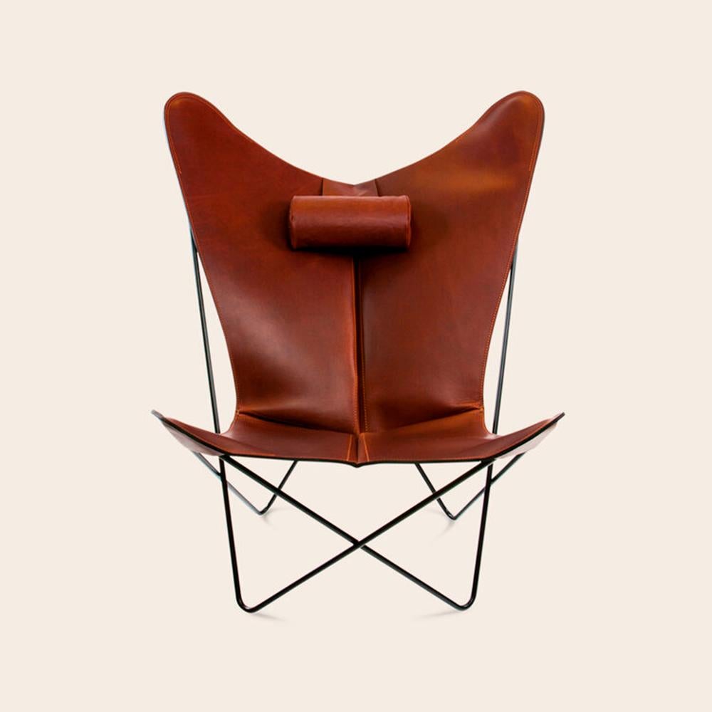 Cognac and black KS chair by Ox Denmarq
Dimensions: D 80 x W 98 x H 108 cm
Materials: leather, stainless steel
Also available: Different leather colors and other frame color available.

Ox Denmarq is a Danish design brand aspiring to make