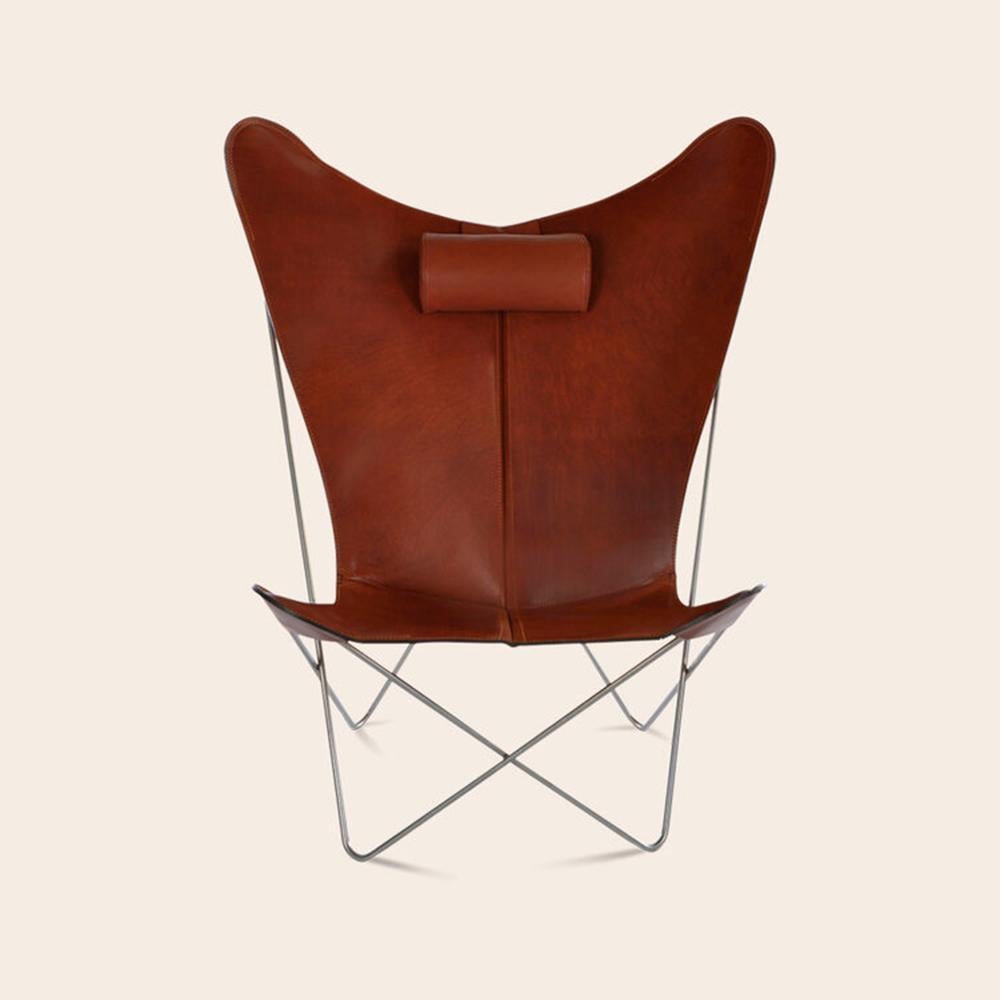 Cognac and steel KS chair by OxDenmarq
Dimensions: D 80 x W 98 x H 108 cm
Materials: leather, stainless steel
Also available: Different leather colors and other frame color available.

OX DENMARQ is a Danish design brand aspiring to make