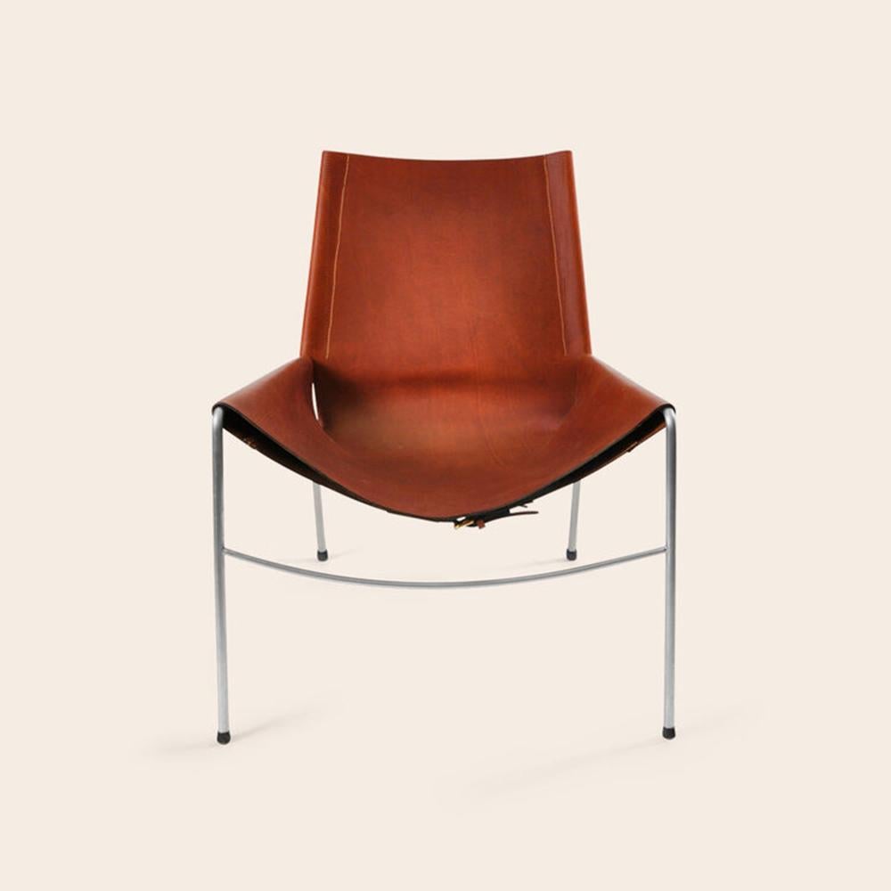 Cognac and Steel November chair by OxDenmarq
Dimensions: D 71 x W 76 x H 88 cm
Materials: Leather, Stainless Steel
Also Available: Different leather colors and other frame color available.

OX DENMARQ is a Danish design brand aspiring to make