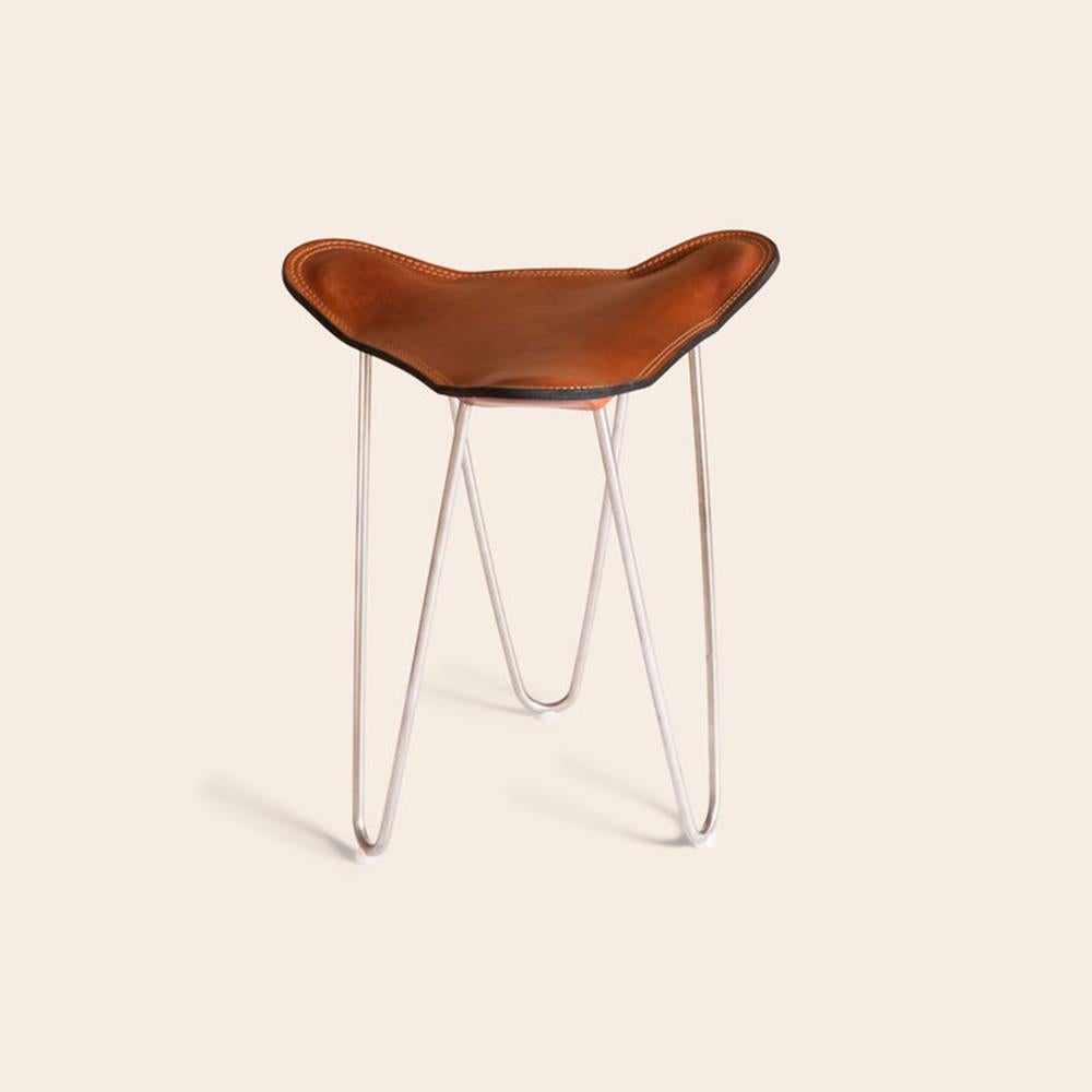 Cognac and Steel Trifolium Stool by Ox Denmarq
Dimensions: D 40 x W 40 x H 45 cm
Materials: Leather, Steel
Also Available: Different colors and other frame color available,

OX DENMARQ is a Danish design brand aspiring to make beautiful