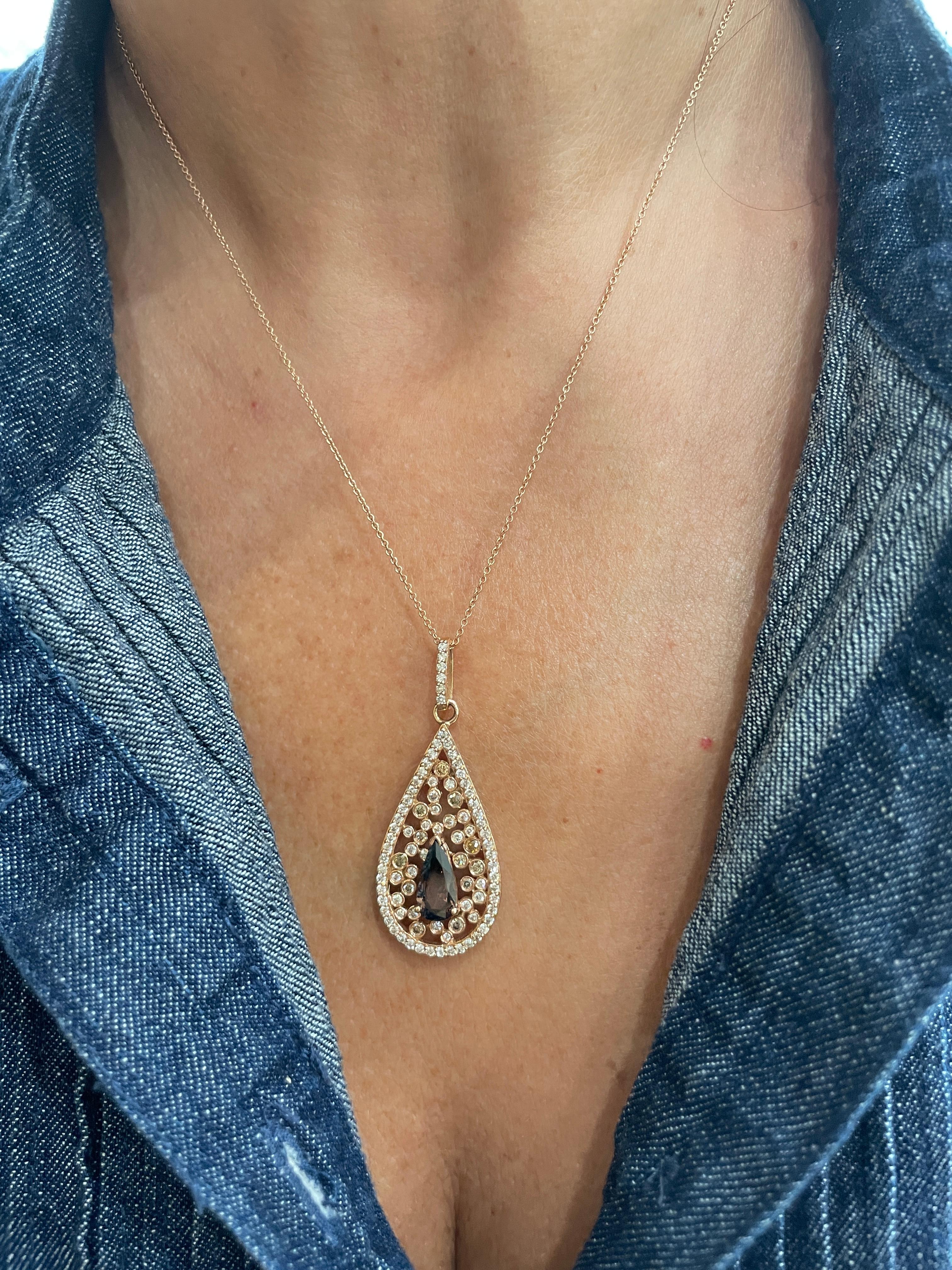Material: 14K Rose Gold
Center Stone Details: Cognac Color Diamond at 1.35 Carats
Side Stone Details: White Diamonds at 0.60 Carats Total Weight
Chain Length: 18 inches
Pendant and Bail Lenth: 1.5 inches

Fine one-of-a-kind craftsmanship meets