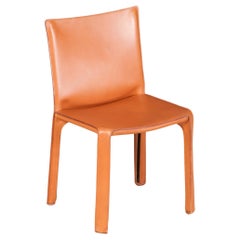 Poltroncine Cab in pelle marrone cognac di Mario Bellini per Cassina, firmate