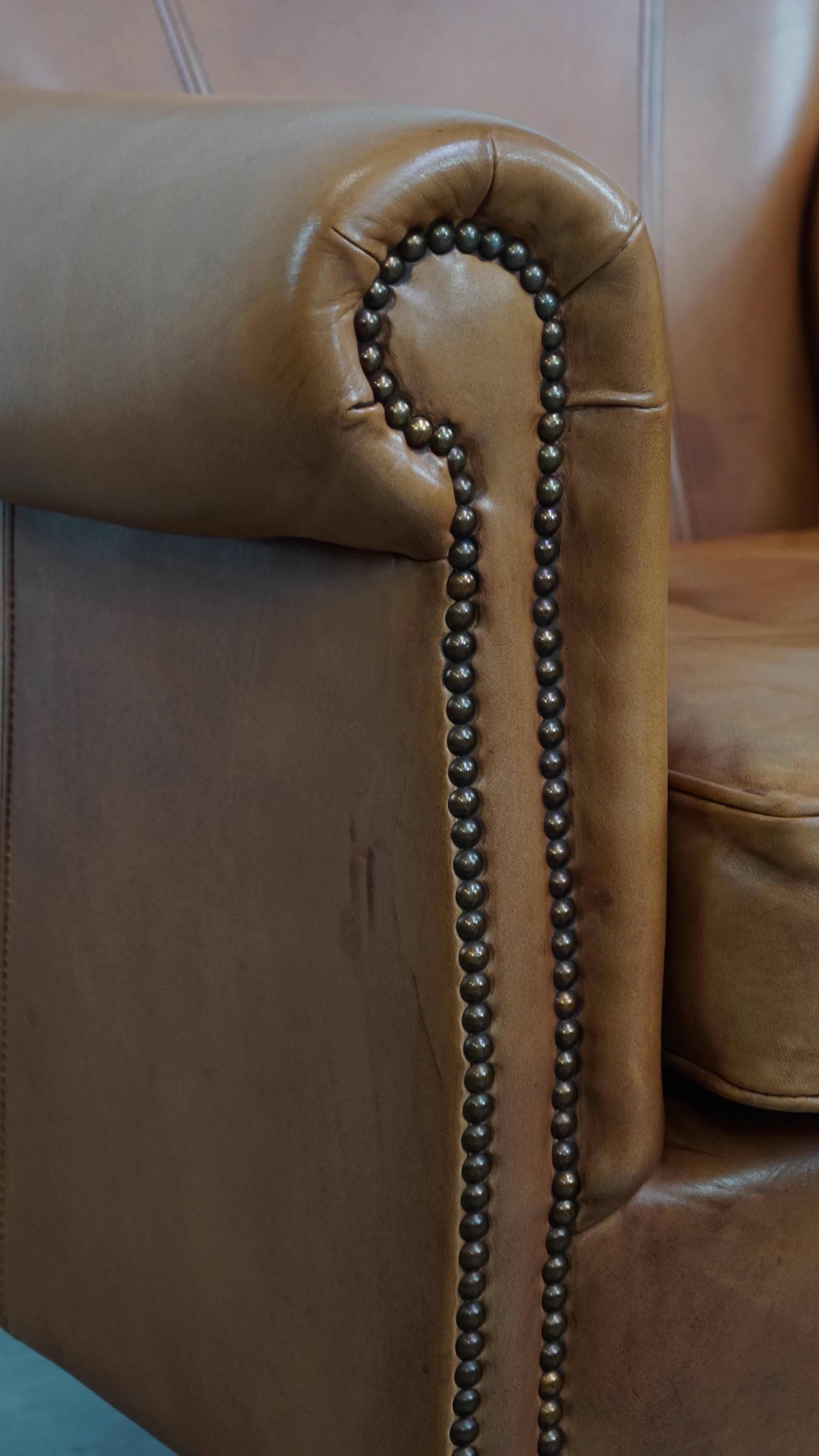 Poltrona e pouf in pelle di vacchetta color cognac in vendita 5