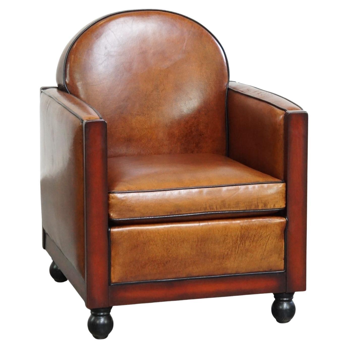 Cognac-colored sheepskin Art Deco design armchair