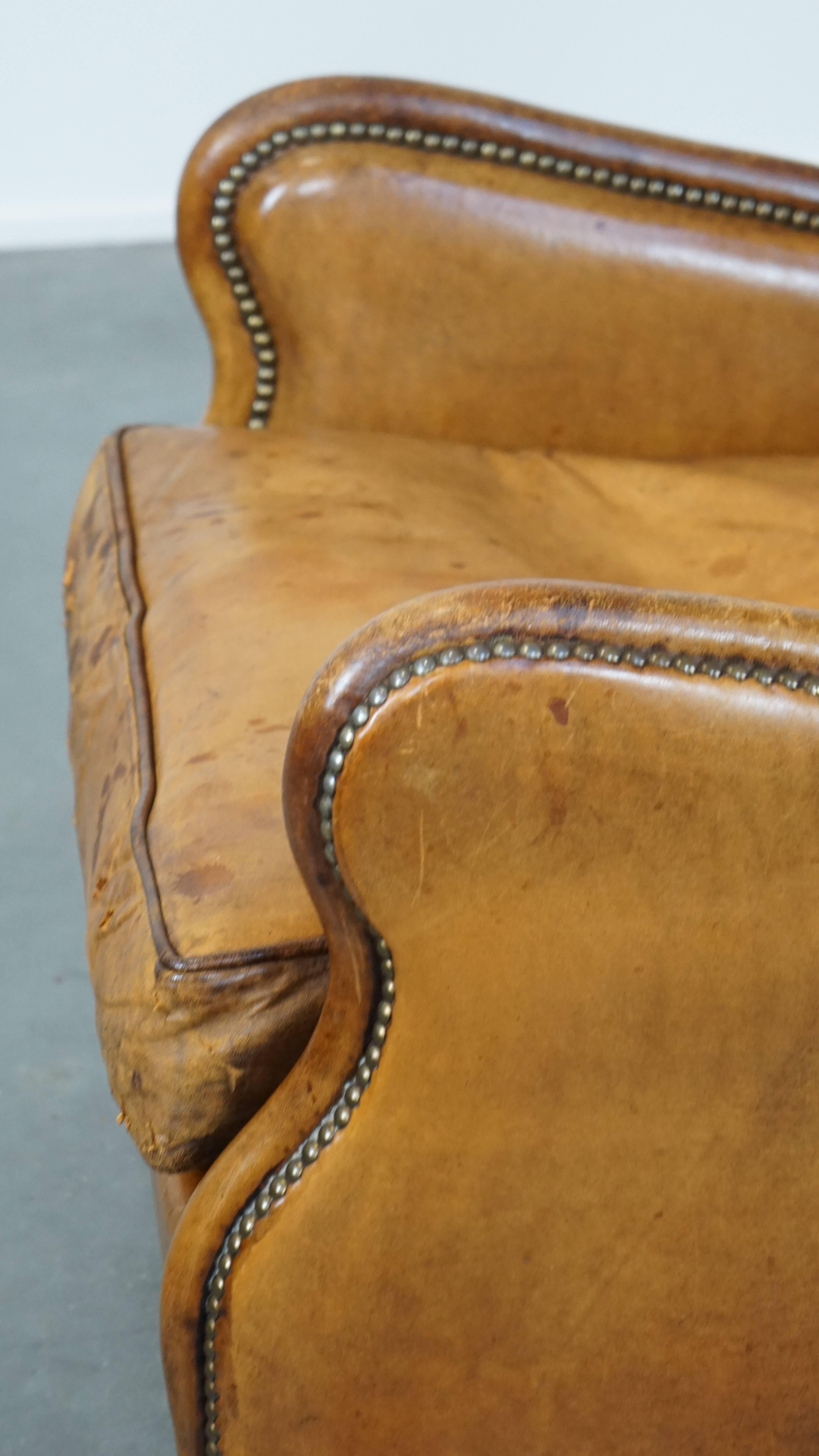 Cognac-Colored Vintage Sheepskin Leather Armchair with a High Back For Sale 7