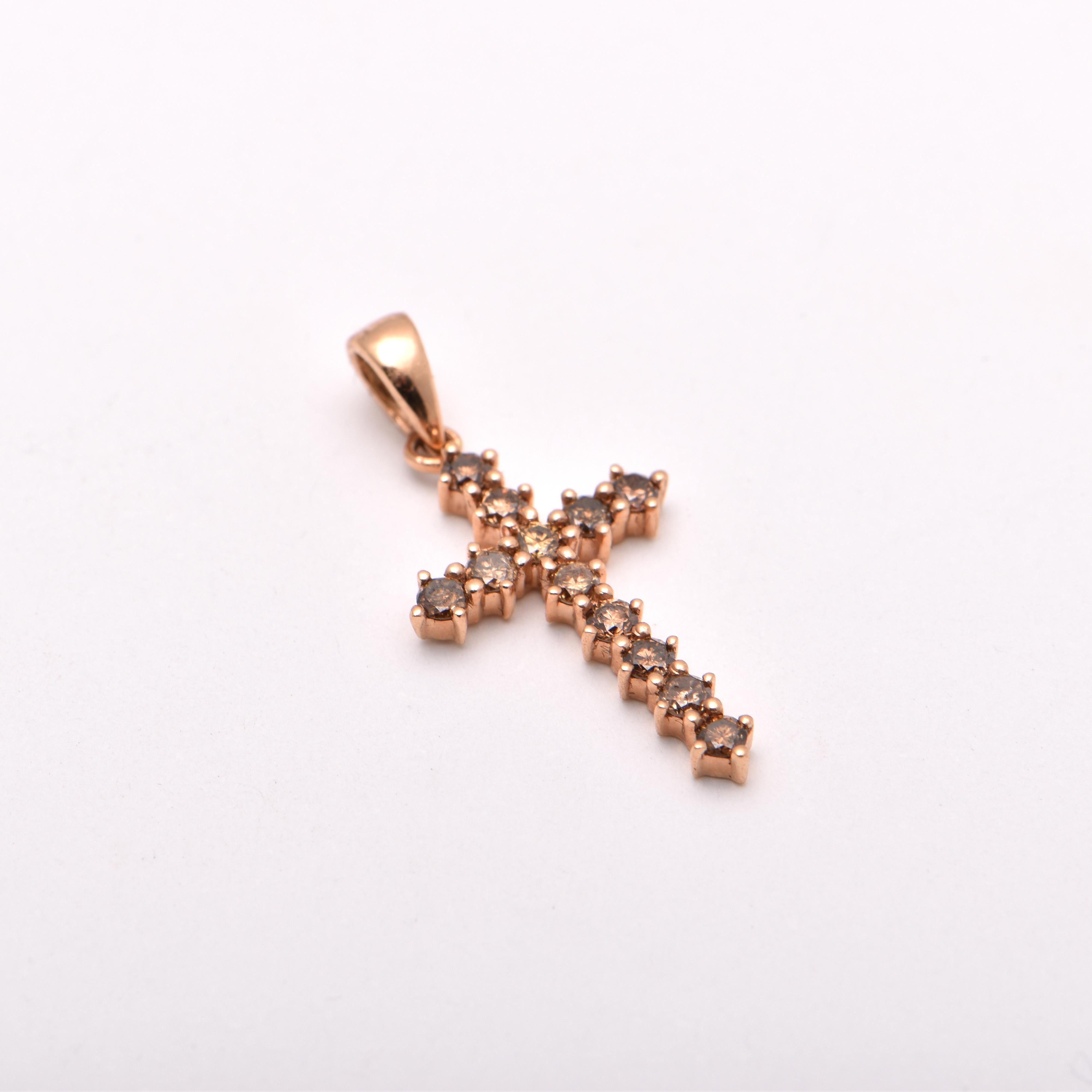 Diamond Cross Pendant; featuring 12 Round Brilliant Cut Brown diamonds totalling 0.37 Carats, set in 18ct Rose Gold (total 1.05 grams)   

*Chain not included

FREE express postage usually 3-4 days Sydney to New York  
FREE international insurance 