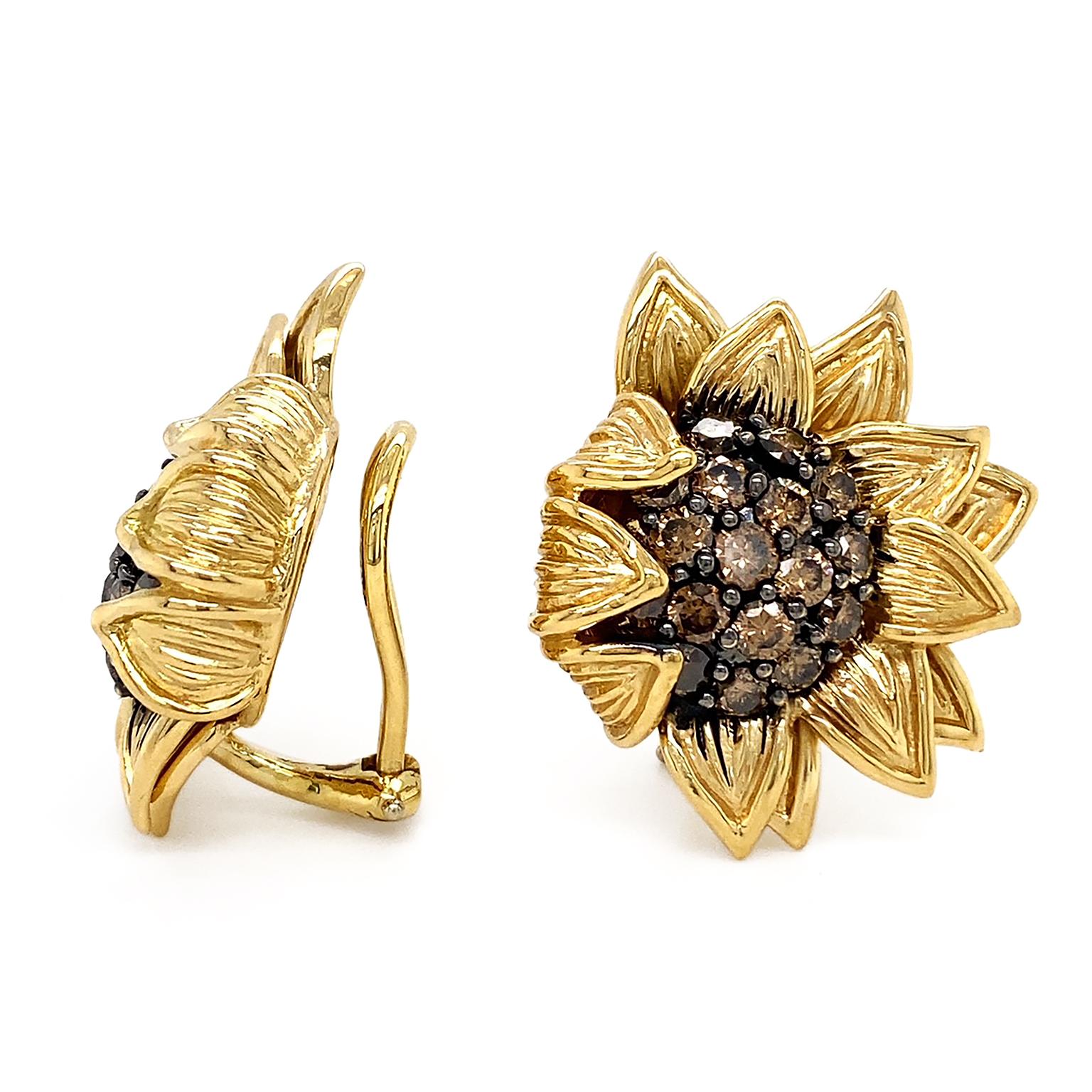 Inspired by the natural beauty of sunflowers, 18k yellow gold petals are textured and arranged in an overlapping pattern. A few of the petals fold over for added harmony. A total of 34 round cognac diamonds produce radiance in the center of the