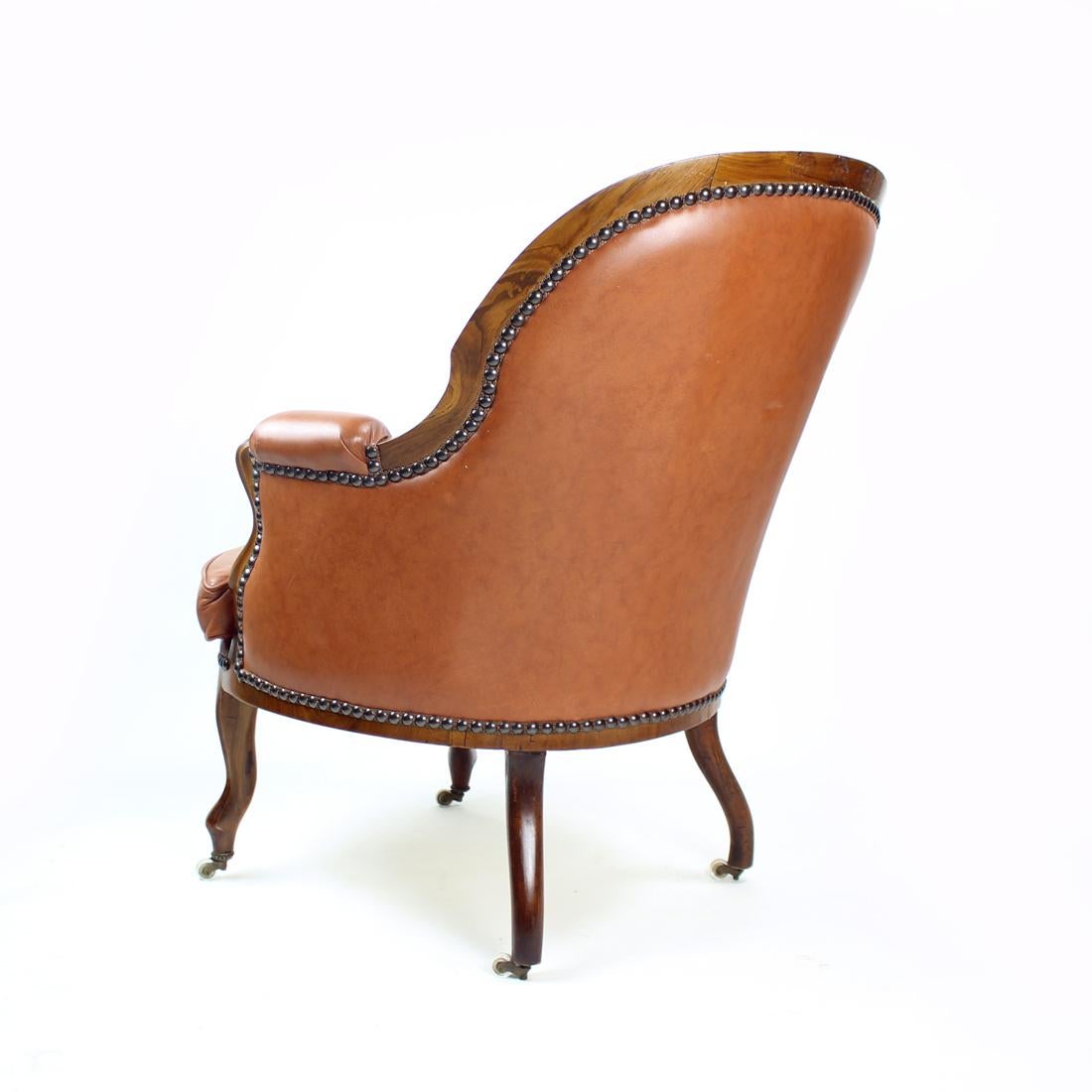 Mid-20th Century Cognac Faux Leather And Walnut Armchair, Czechoslovakia 1950s For Sale