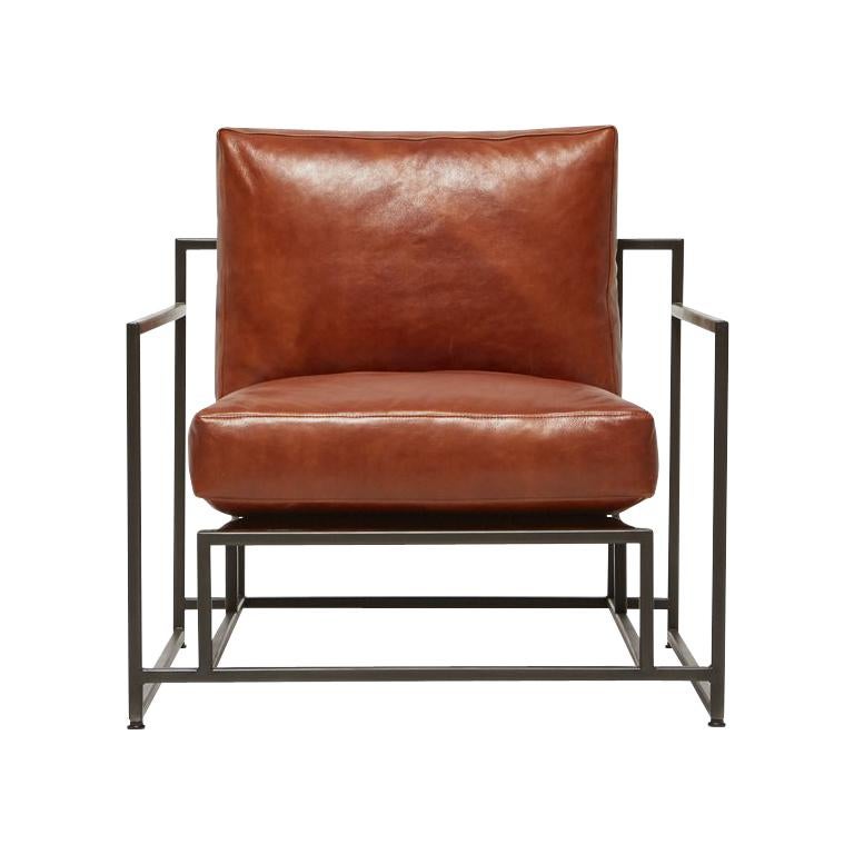 Fauteuil en cuir cognac et acier noirci en vente