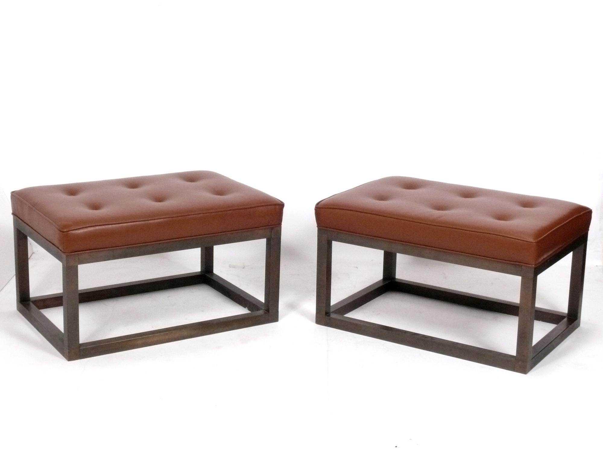 Cognac Color Leather and Bronzed Finish Metal Benches, American, circa 1980s. They have recently been reupholstered in a supple cognac color leather and are ready to use. They are a versatile size and can be used individually as stools or end