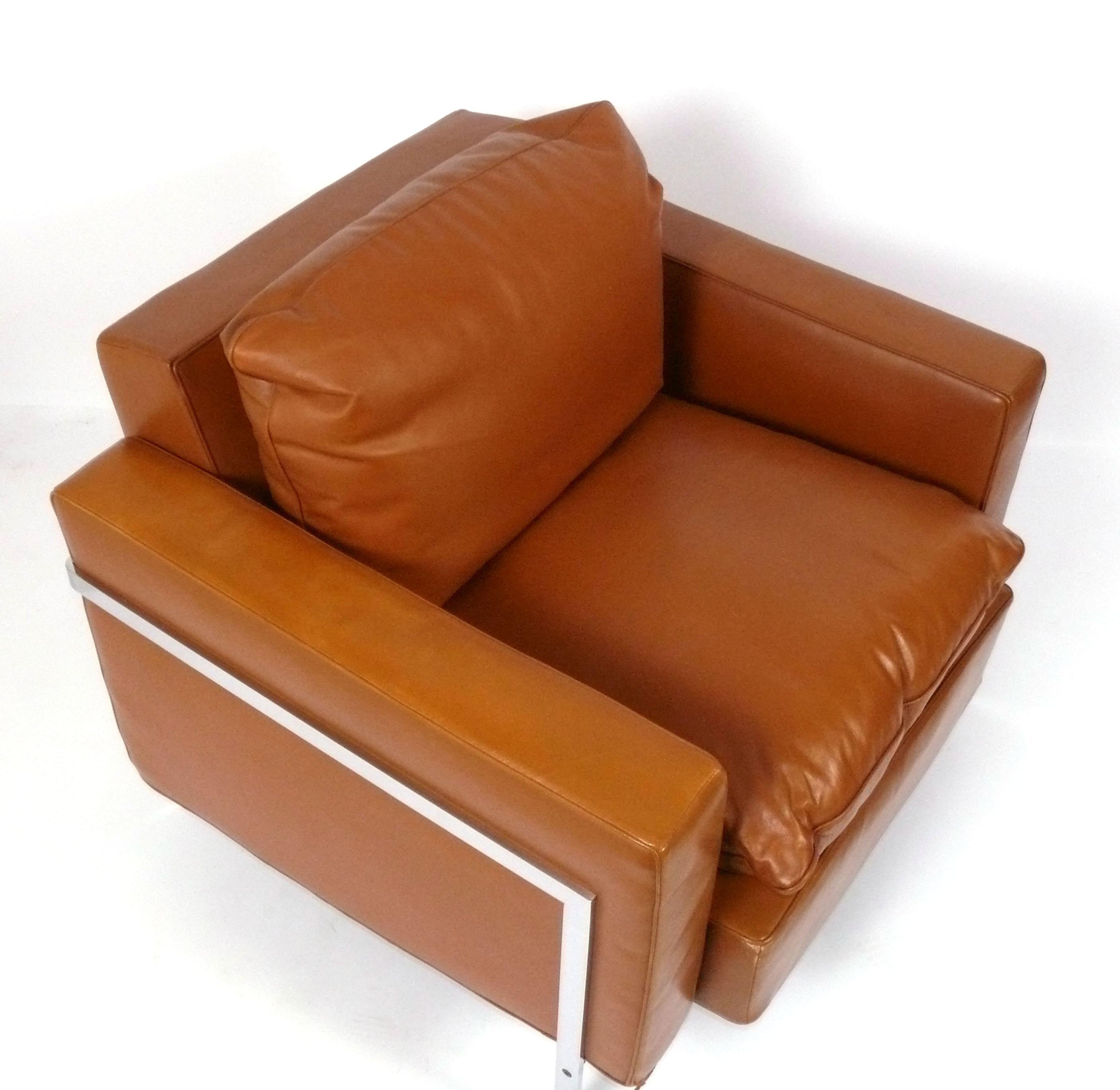 Cognac Leather and Chrome Architectural Lounge Chair, designed by Robert and Trix Hausmann for De Sede, Switzerland, circa 1970s. Imported to the US by Stendig and signed with Stendig label. This lounge chair is in great condition, with only minor