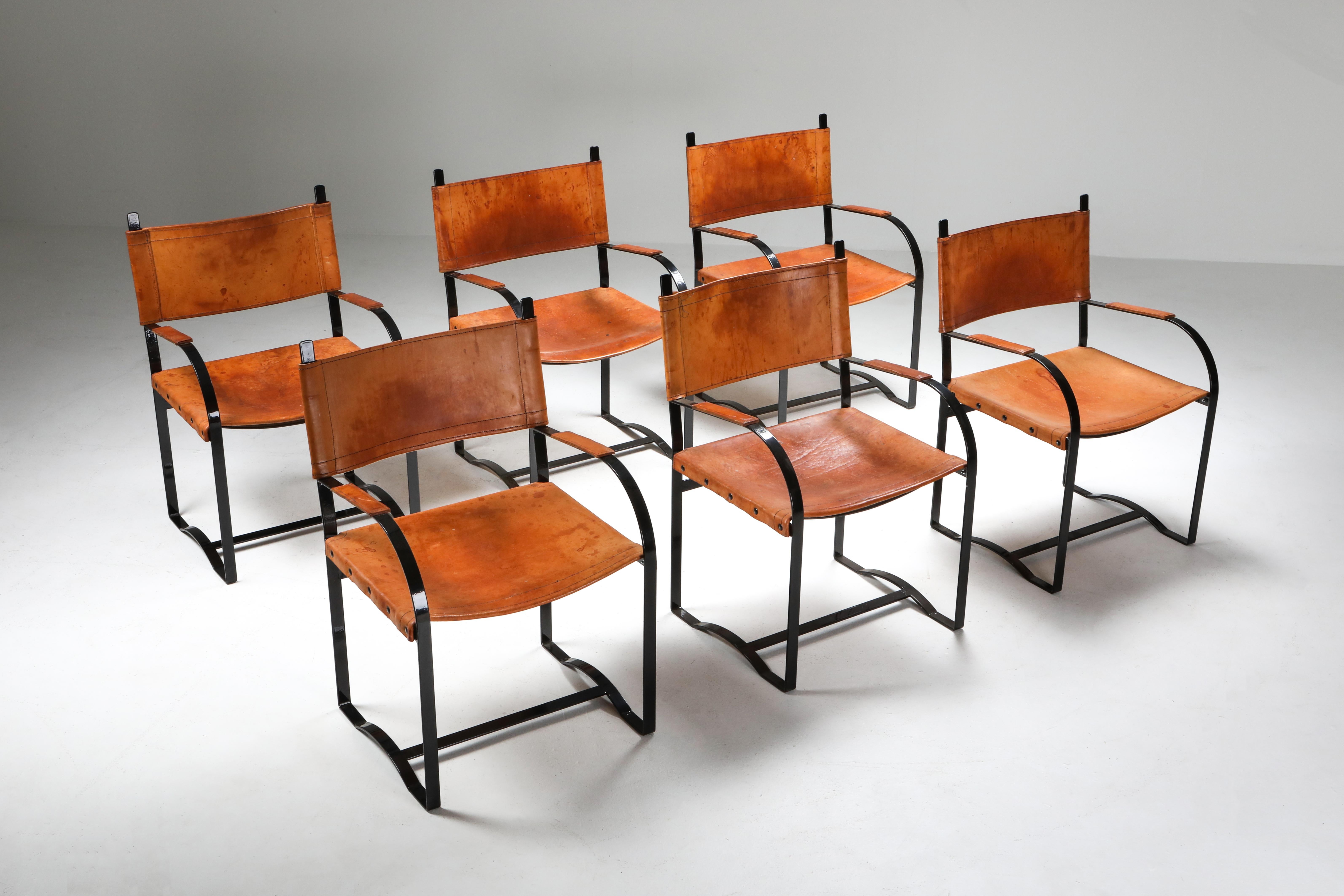 black lacquer steel and patinated cognac leather chairs, set of six, Belgium, 1960s

Unusual set of six side chairs, thick leather seating, solid steel frame
They would fit well in a rustic modern, chalet style interior.

  