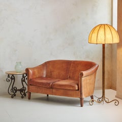 Cognac Leather Barrel Back Loveseat, France 1970s