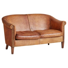 Cognac Leather Barrel Back Loveseat, France 1970s