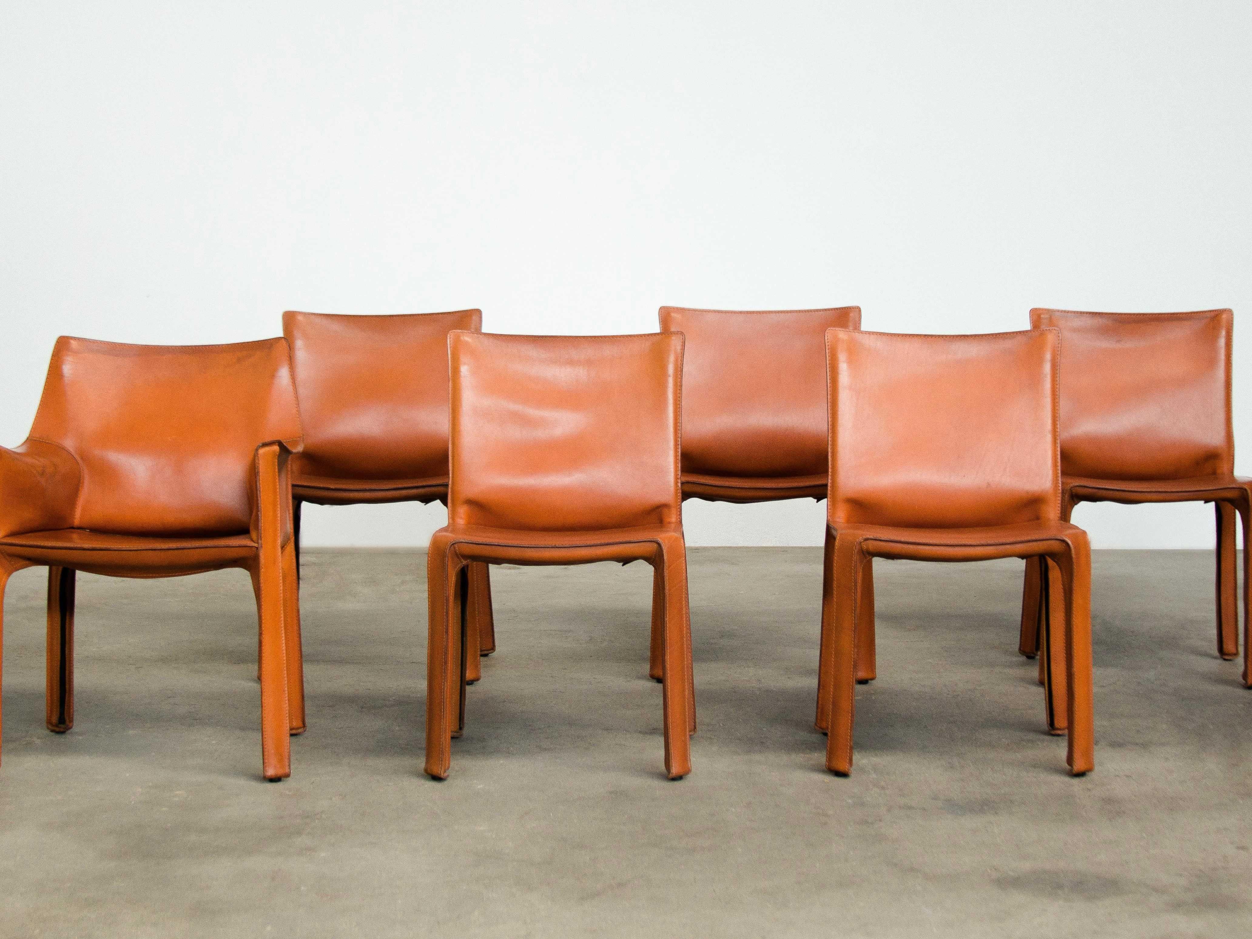 Set of 5 cab chairs with beautiful patinated leather by Mario Bellini for Cassina, Italy, 1980s.
 