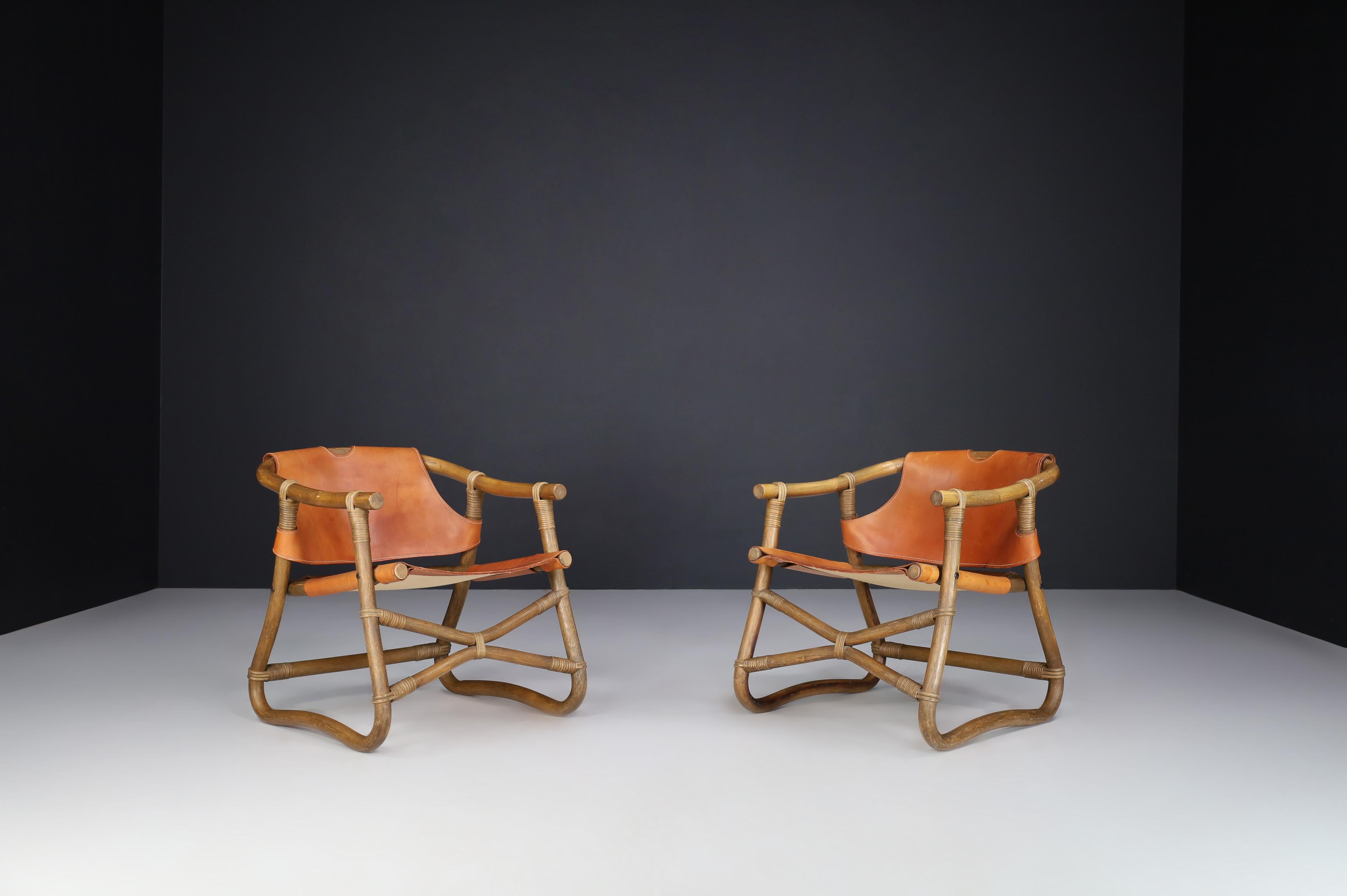 Cognac leather Esprit safari lounge Chairs by IKEA Sweden 1970s.

Ikea designed this safari Lounge chair in the 1970s. It is made of bamboo and cognac saddle leather. The design and the look and feel of this occasional chair reminded me of what