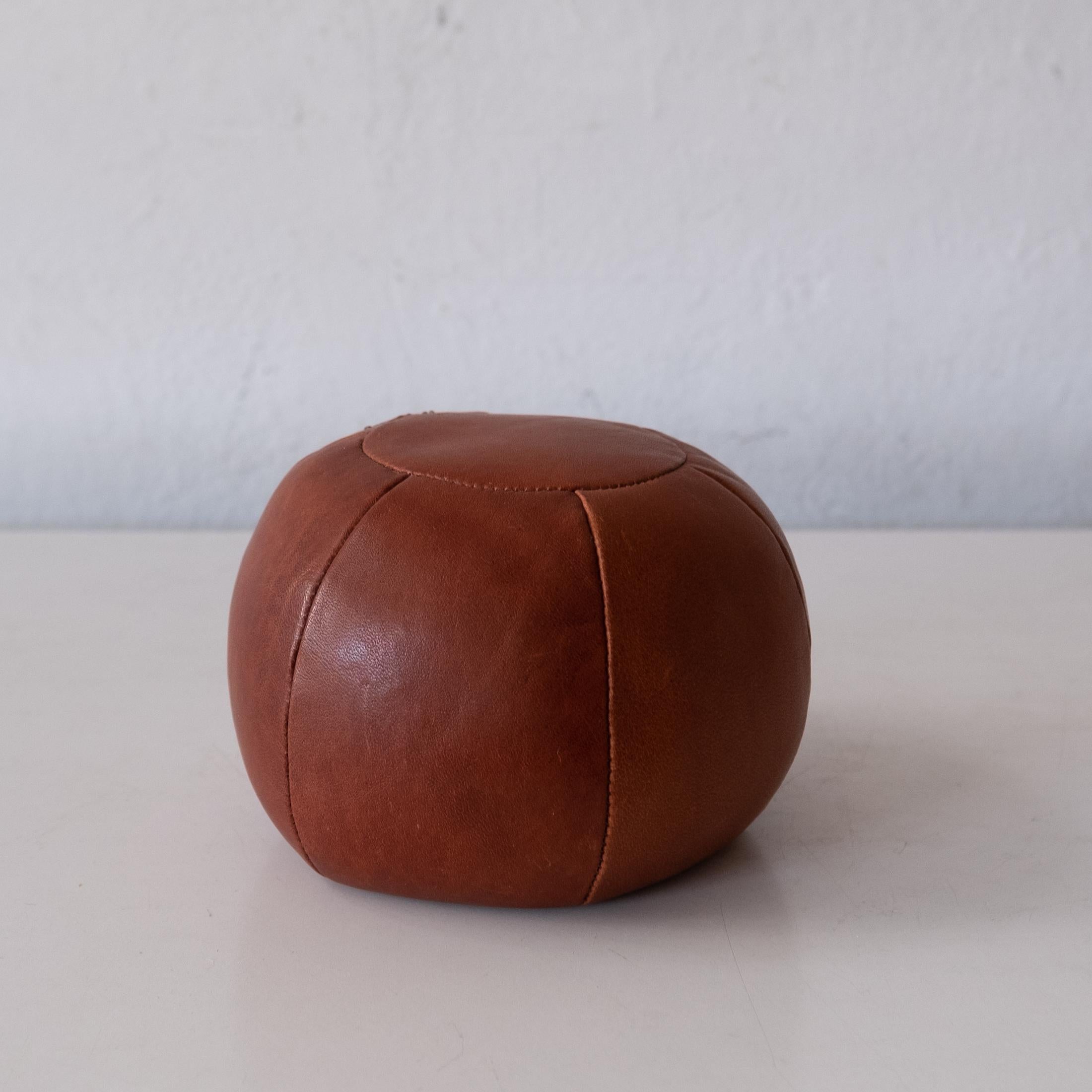Late 20th Century Cognac Leather Medicine Ball Paperweight For Sale