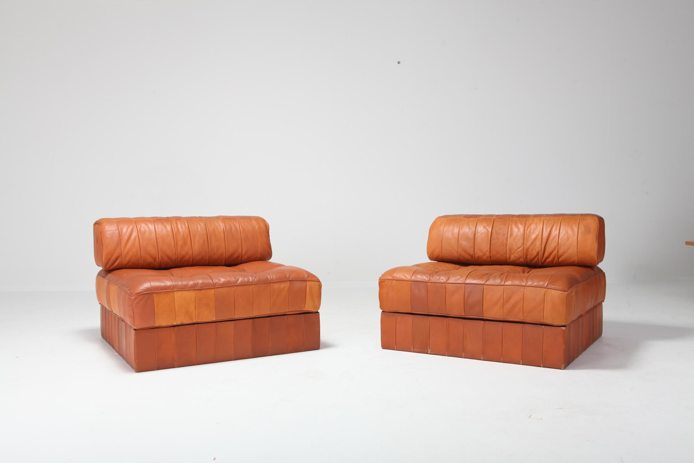 Mid-Century Modern easy chairs by De Sede Switzerland
Cognac leather patchwork upholstery.
In fantastic condition considering age and use.