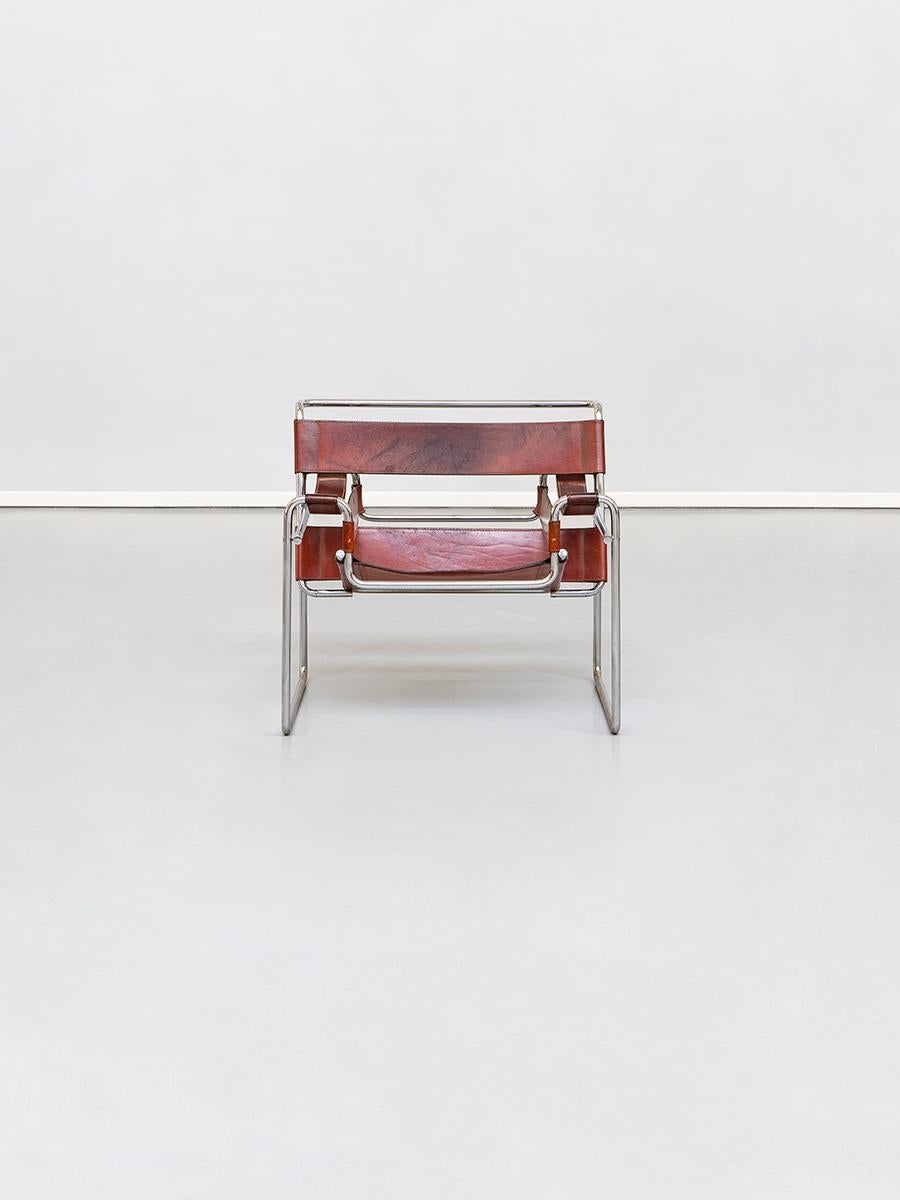 Cognac leather Wassily armchair by Marcel Breuer for Knoll International, 1968.
Mod.B3 armchair by Marcel Breuer, well known as Wassily, was designed in 1925.
The iconic armchair has a chromed metal structure and all the seat in cognac leather,