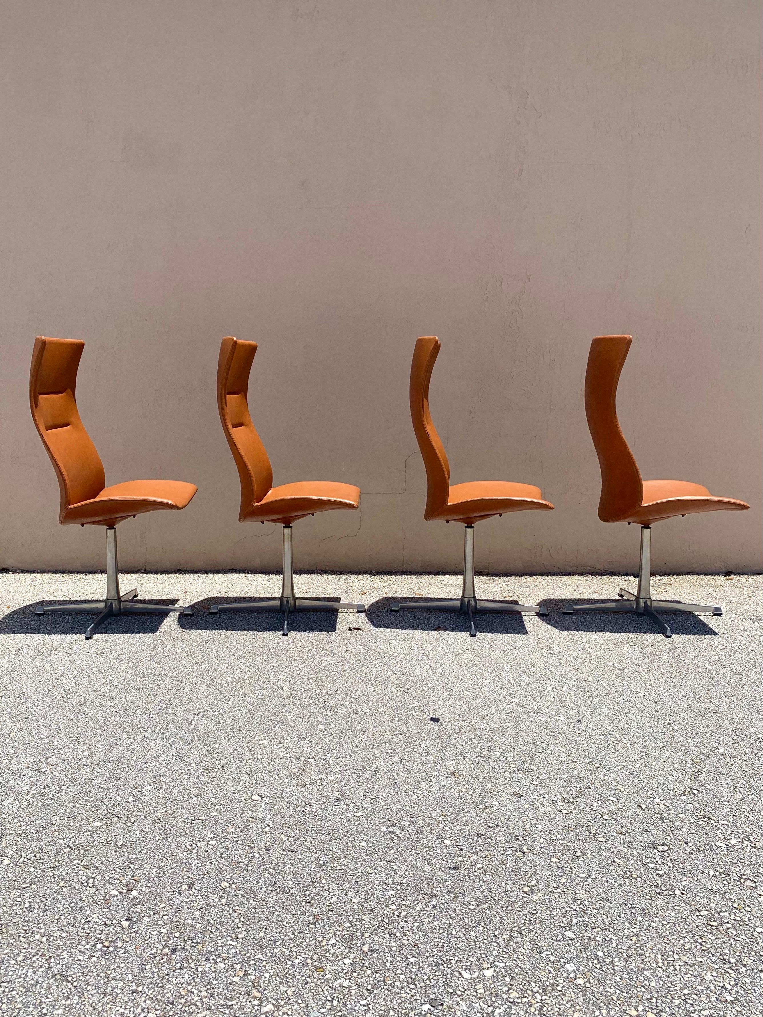 Mid-Century Modern Cognac Overman High Back Swivel Dining Chairs, set of 4 For Sale