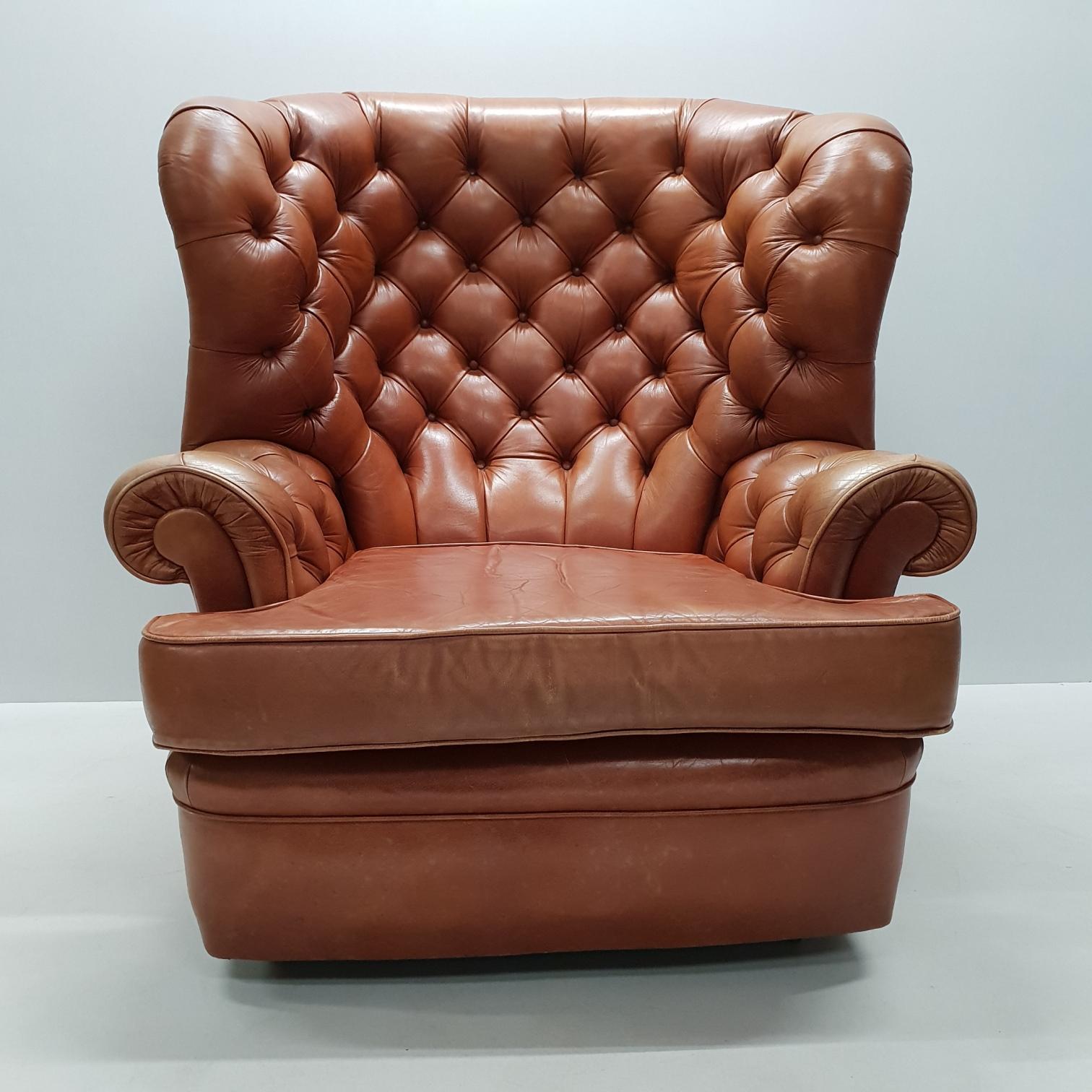 Cognac leather wing chair by Whittle Brothers of Warrington, 1970s
Labelled.
The upholstery is Pegasus leather.
Upholstered by Wade upholstery Long Eaton.
 