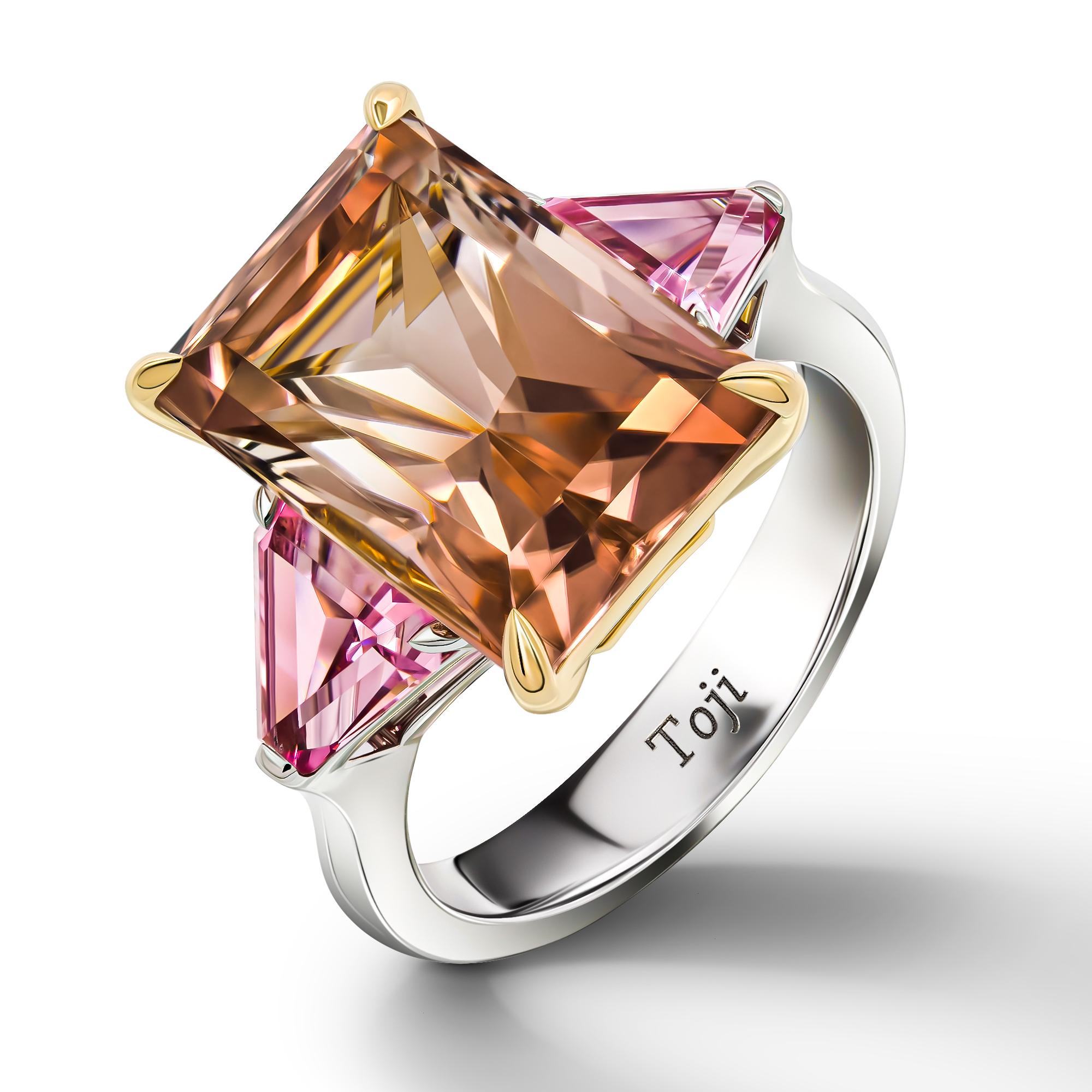 •	18k white gold.
•	Cognac Tourmaline in Fantasy cut – total carat weight 9.12. 
•	Pink Spinels in triangle cut – 2 pc total carat weight 2.23.
•	Ring Size – 7
•	Product weight – 5.77 grams.
