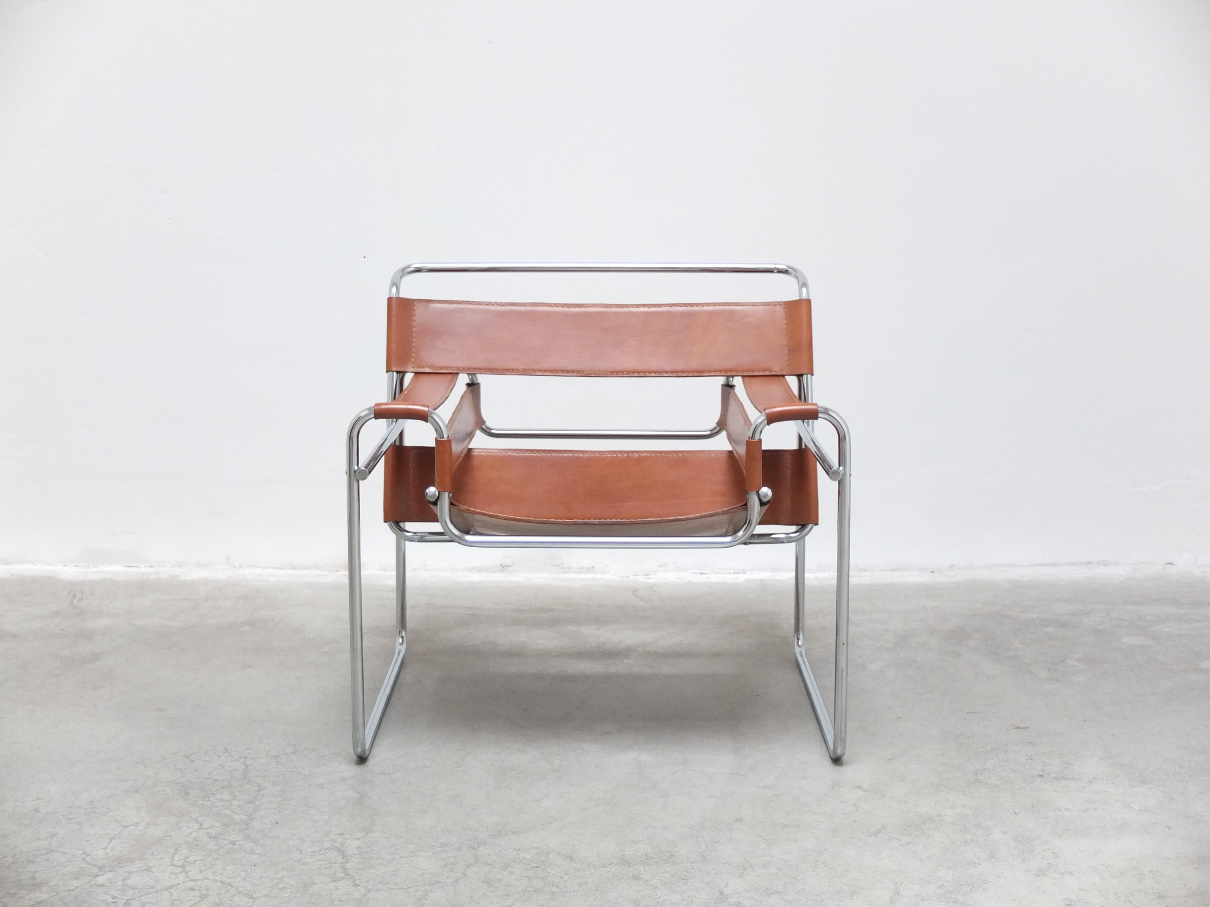 Iconic model ‘B3’ or ‘Wassily’ lounge chair designed by Marcel Breuer in 1927. This chair has lots of character thanks to the beautiful patinated cognac leather combined with a chromed tubular steel frame. Produced around 1980 most likely by Gavina.