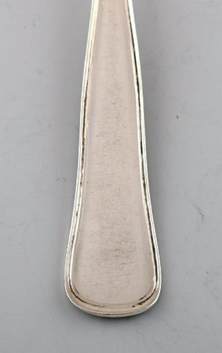 Cohr (Denmark) Old Danish lunch fork, silver cutlery, 1950s.
12 pieces. In stock.
Measures: 18 cm.
Stamped.
In very good condition.