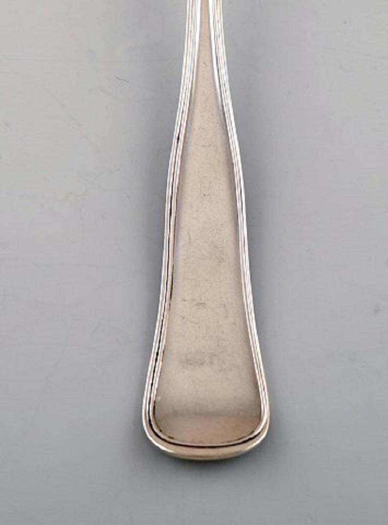 Cohr dinner fork, Old Danish silver cutlery. 1950s.
4 pieces in stock.
Measures 21 cm.
Stamped: COHR.
In very good condition.