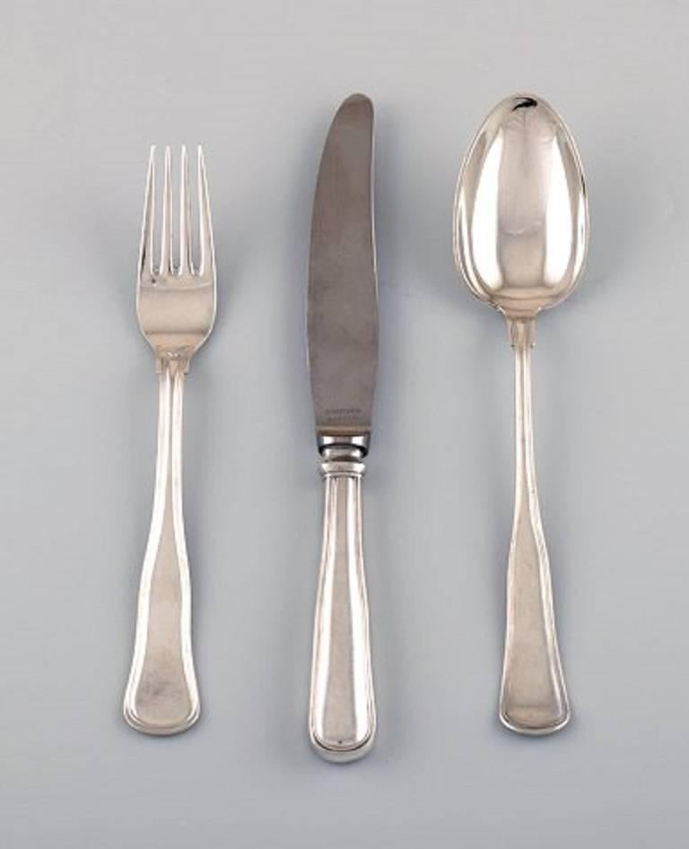Cohr Old Danish silver cutlery for six person. A total of 18 pieces.
The set consists of six spoons, six forks, six knives.
Stamped 830S and Cohr.
In very good condition.
Knife measures 20 cm.
