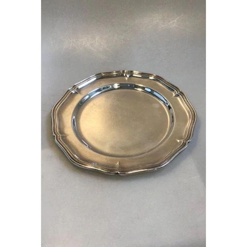 Cohr silver tray/charger/plate.

Measure: diameter 28 cm(11 1/32 in), weight 502 gr (17.70 oz).