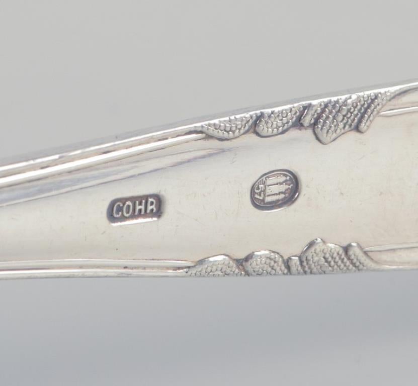 20ième siècle Cohr. Deux cuillères à manger en argent 830. en vente