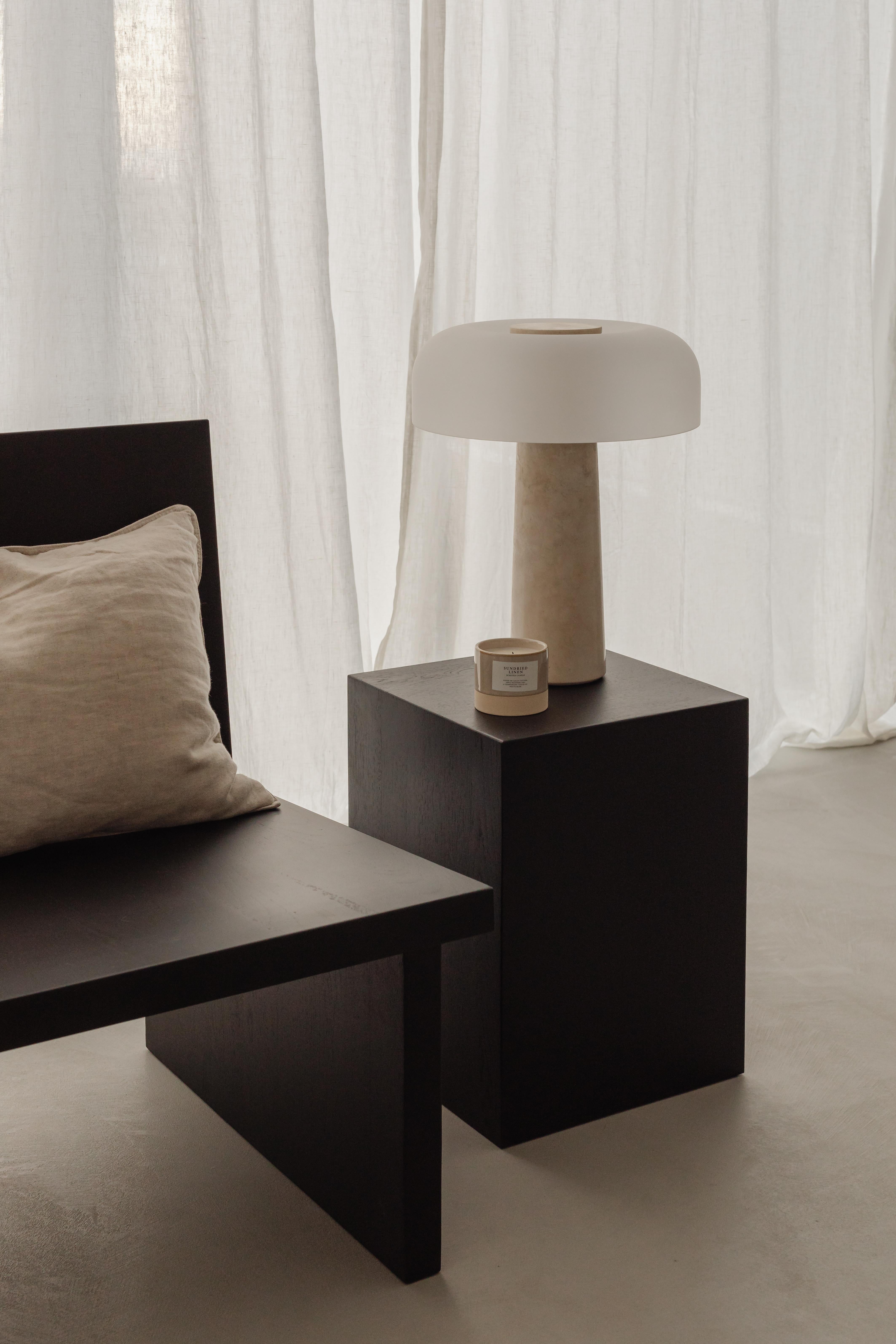 COI is a minimalist and elegant piece of furniture with many functions. It can be a bedside table, side table or seat. You can put a vase or your favourite lamp on it. Its simple design draws attention to the beauty of the material and the precision