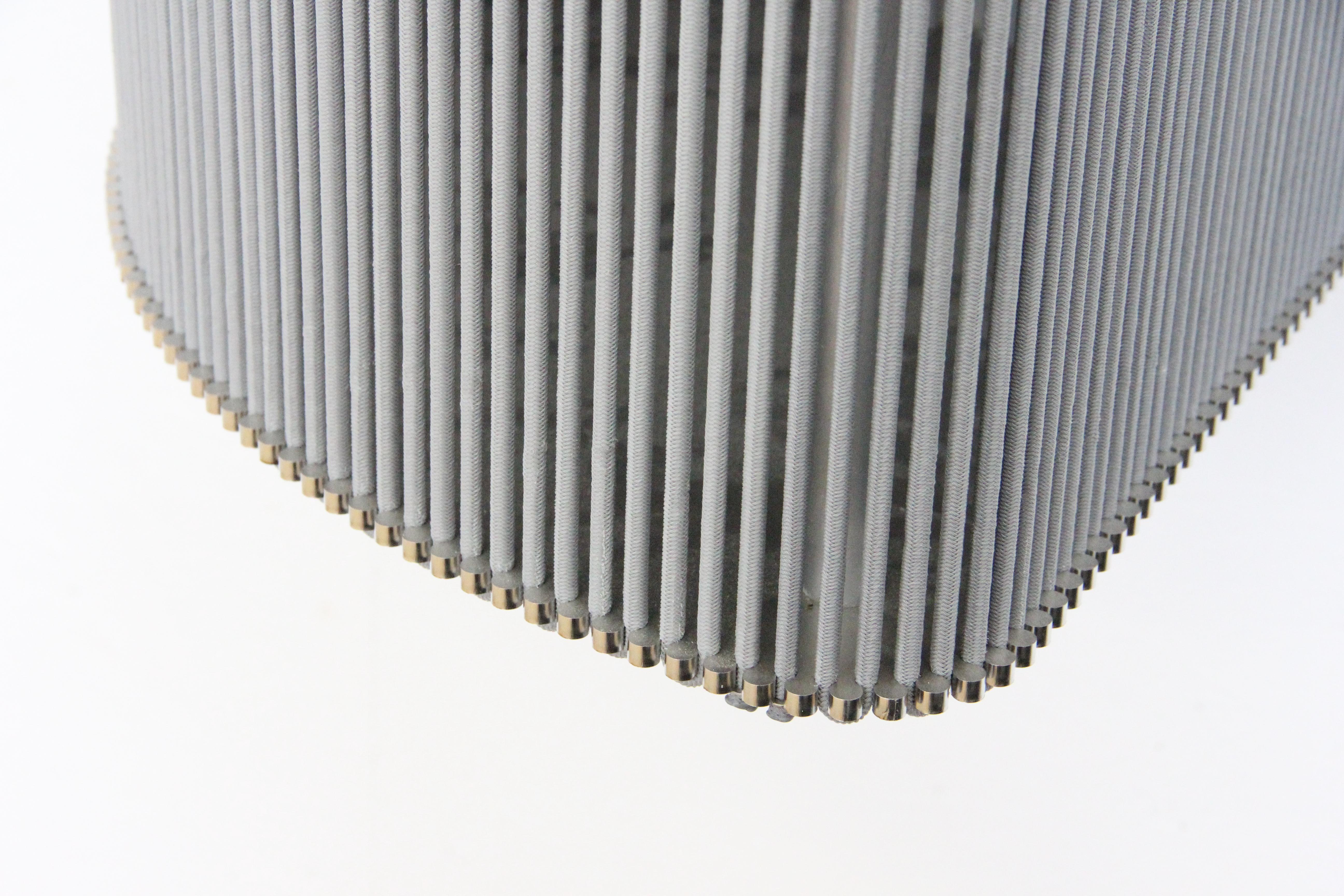 Aluminum Coil #1 Low Cabinet by Bram Kerkhofs