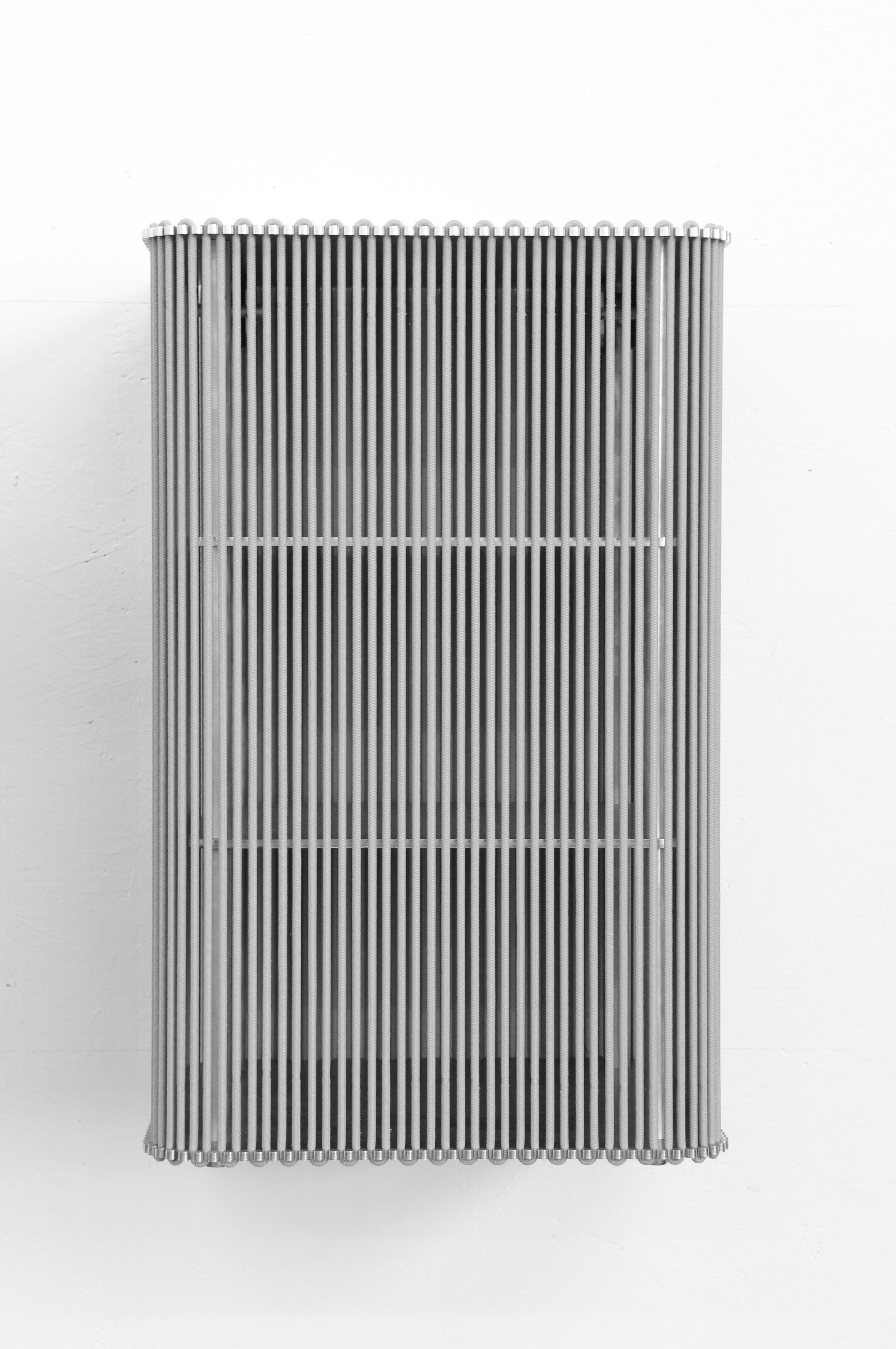 Coil #3 cabinet wall mounted by Bram Kerkhofs
Dimensions: D 80 x W 40 x H 122.4 cm.
Materials: stainless steel, aluminium, elastic rope (natural rubber, polyethylene).

Other dimensions are available. 

Coil is a modular cabinet system in