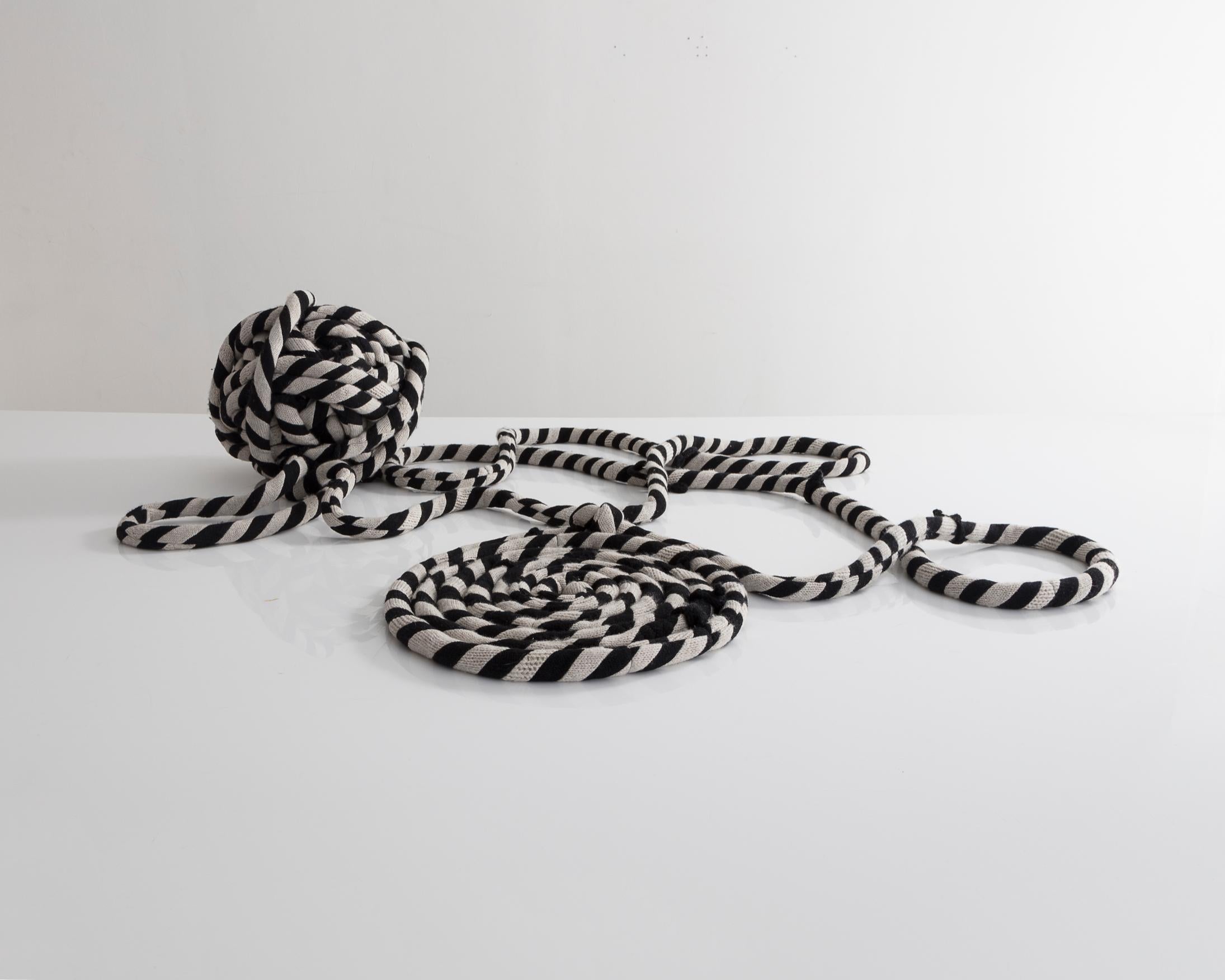 Unique coil sculpture in black and white cashmere. Designed and made by Greg Chait, USA, 2016.
  