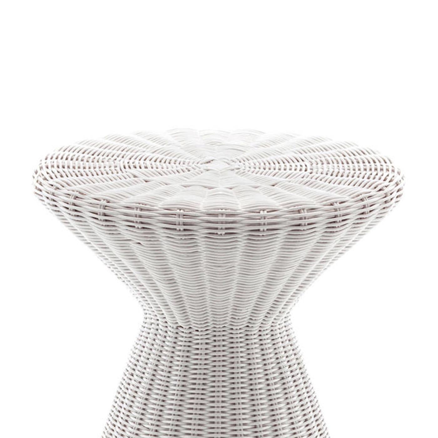 Side table coil white all
in handwoven rattan core, 
strong braided. In white finish.