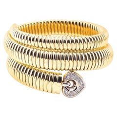 Coiled Snake 14 Karat Yellow Gold Bracelet with Diamonds