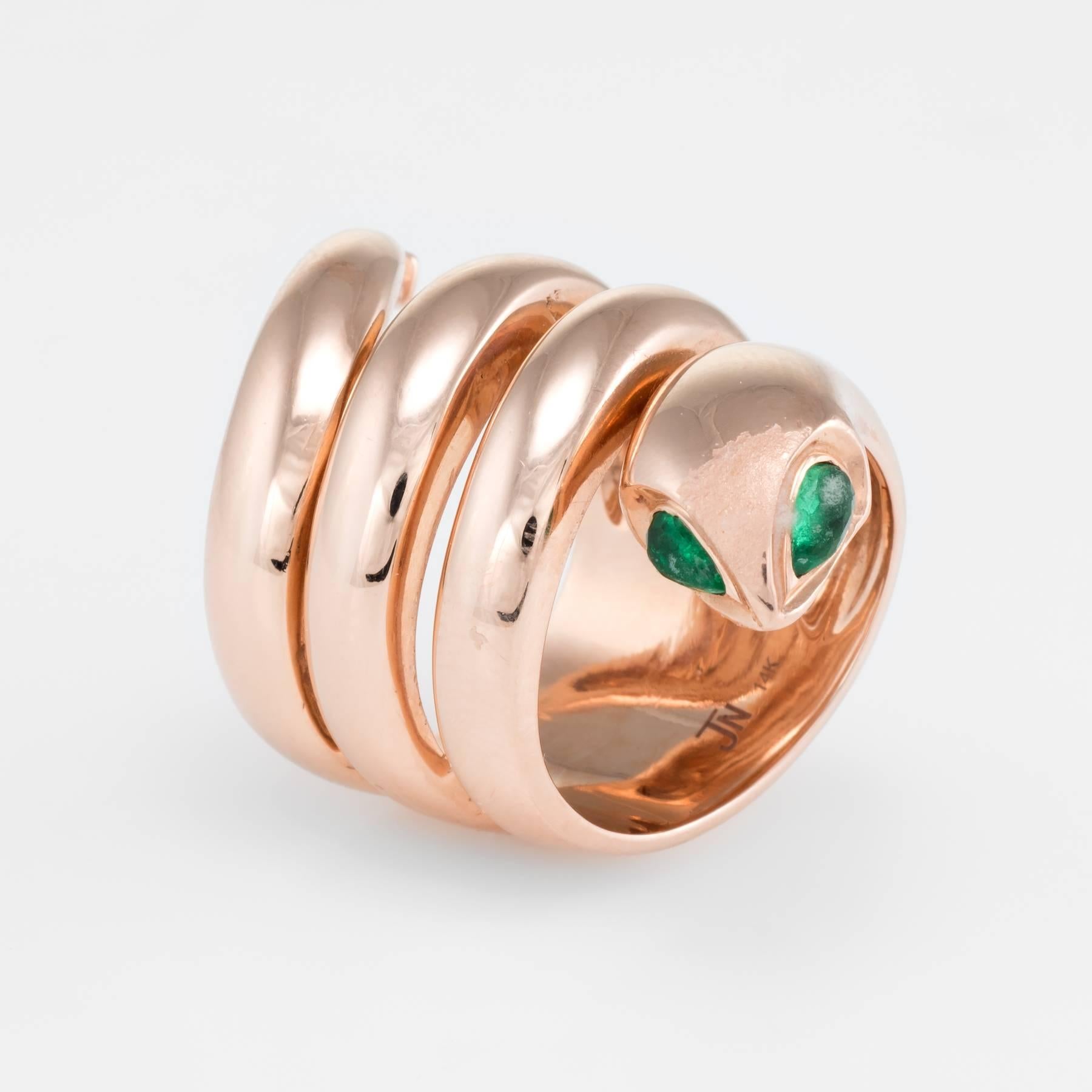 Overview:

Elegant estate snake ring, crafted in 14 karat rose gold. 

Faceted pear cut emeralds are estimated at 0.10 carats each (0.20 carats total estimated weight).    

The ring is in excellent condition. 

Particulars:

Weight: 21.3