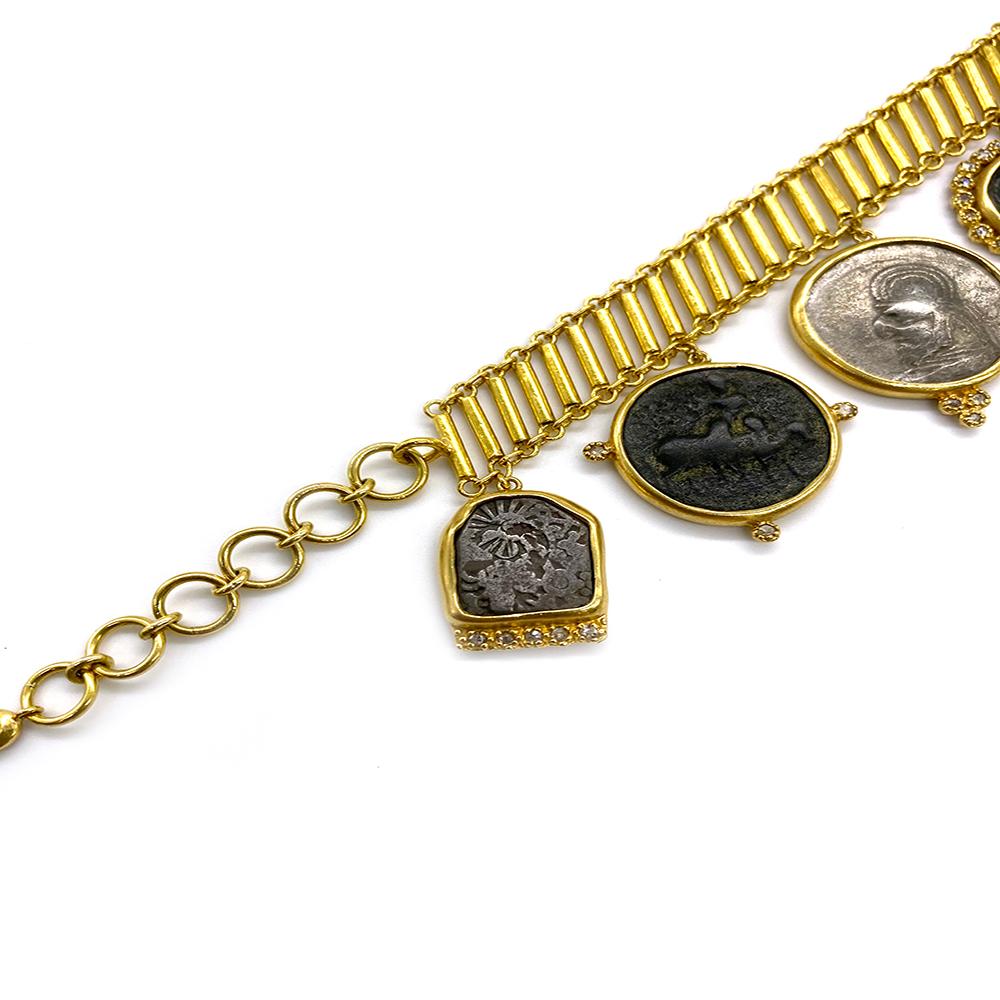 Antiquity Ladder Bracelet Set In 20 Karat Yellow Gold With 1.10 Carat Rose-Cut Diamonds. The Bracelet Comes With Seven Antique Coins That Are Hanging On The Chain.
