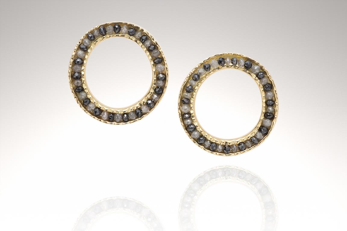 18KY Coin Earrings with Black and White Diamonds are part of the Coin collection. I call this collection the  Coin collection because of the textured worn edges on these pieces, like the edges of an old coin.
They are limited production made to