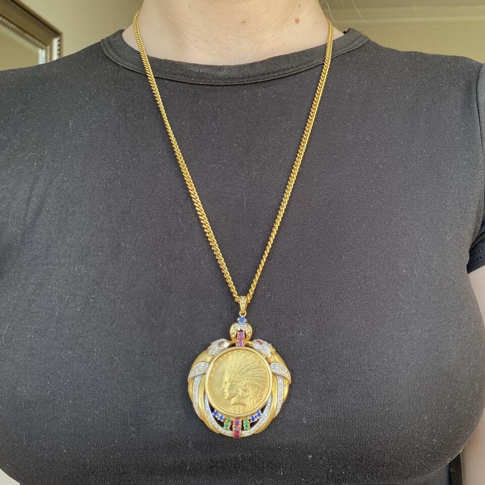 Coin Necklace 10 Dollars With Diamonds & Gemstones 18K Yellow Gold 62.45G
Brand: Unbranded 
Pendant Shape: Round
Type: Pendant
Color: Yellow
Style: Charm
Year Coin Manufactured: 1932
Metal: Yellow Gold
Vintage: Yes
Hellmark:18K