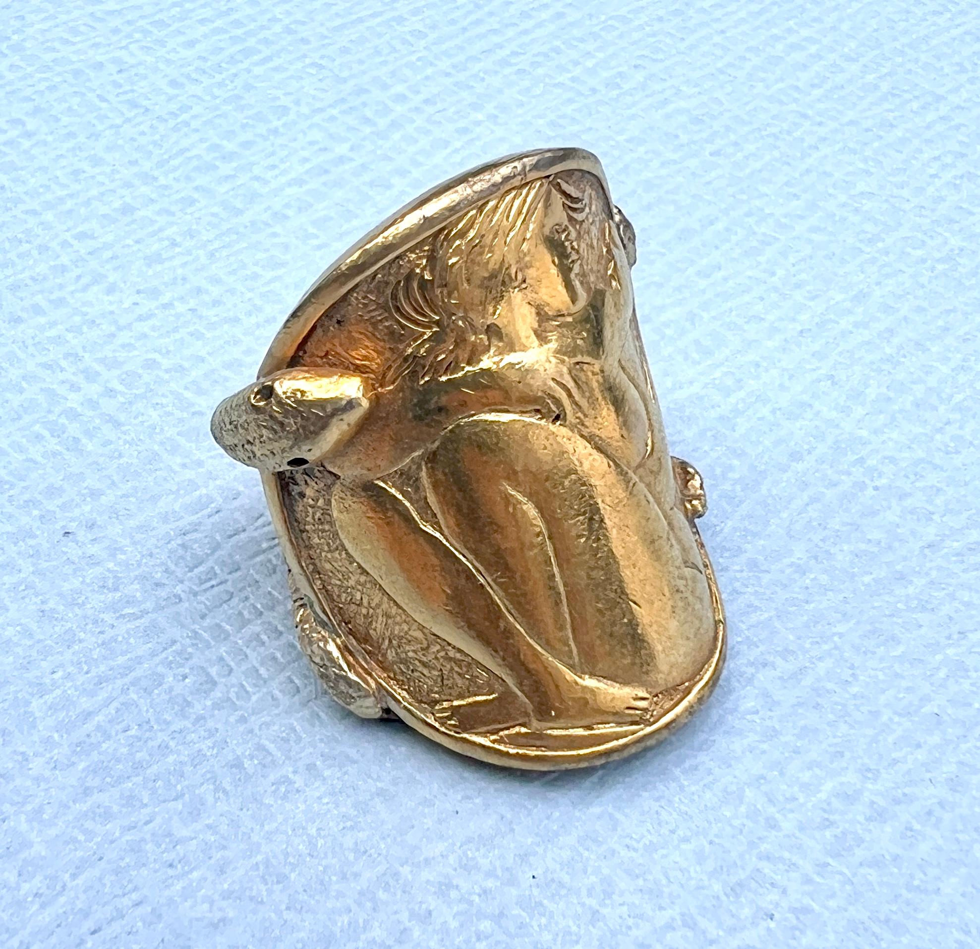 Coin Ring Woman Holding a Mask Snake Gold Plated Brass

J DAUPHIN 
