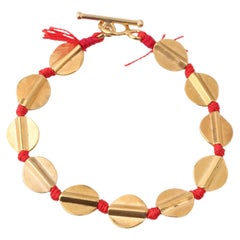 Coins Bracelet in Silk, Bronze & 24k Vermeil Gold by Katerina Makriyianni