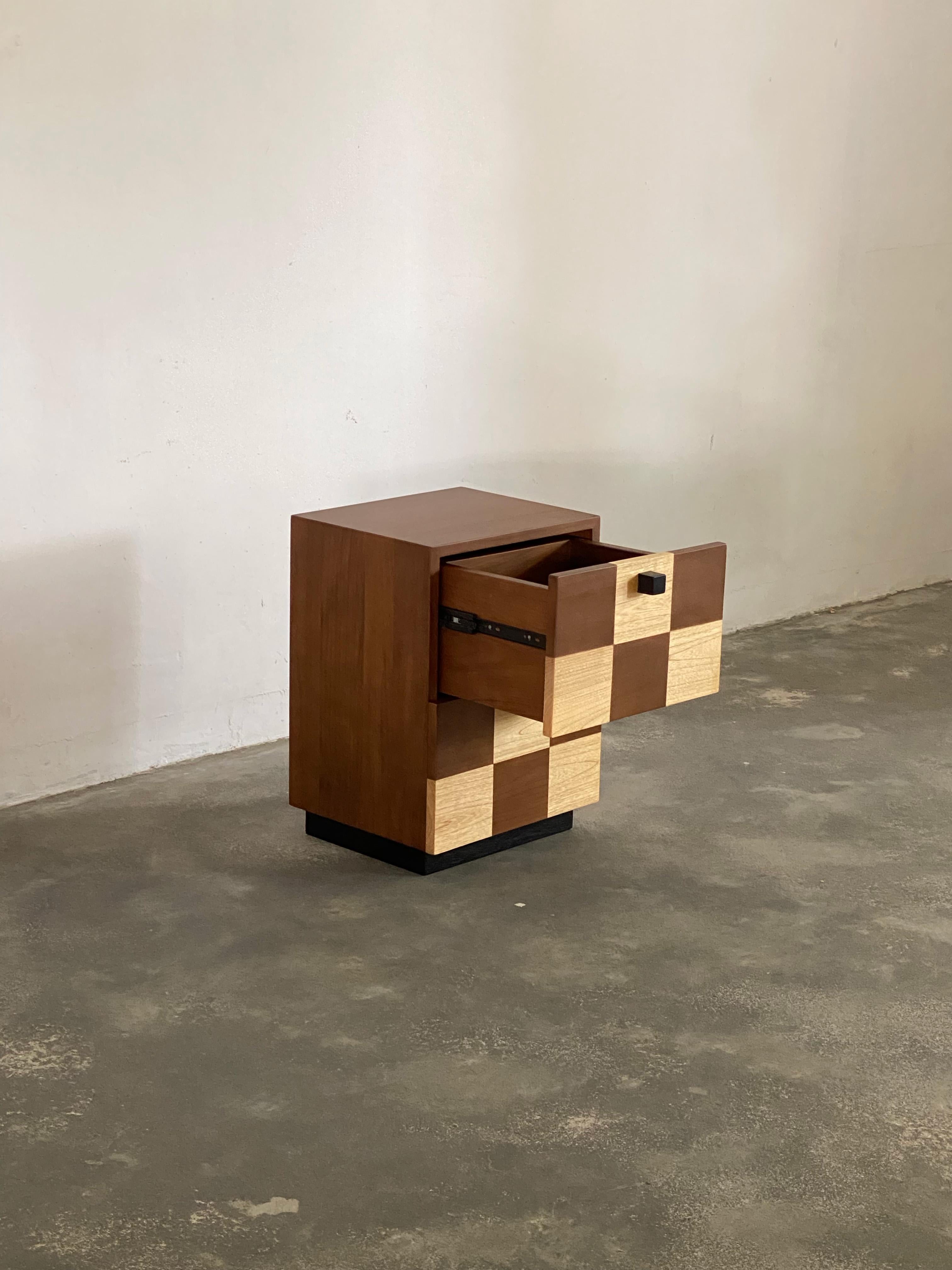 Designed by Studio Kallang and handcrafted by generational artisans in Central Java. The Coklat bedside is an ode to classic midcentury modern forms with a modern, playful twist. Handcrafted from solid teak and sungkai wood native to the region.