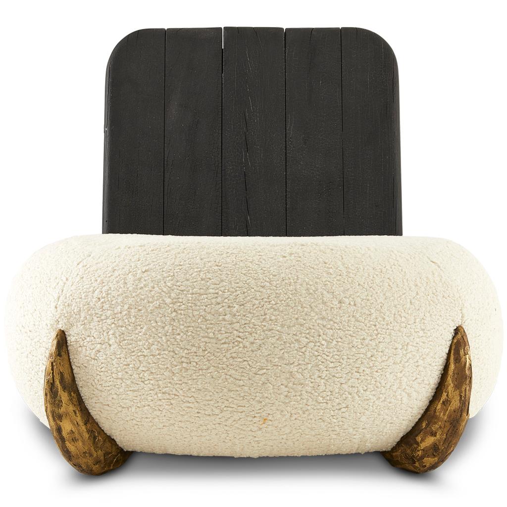 The armless modern Sherpa lounge chair is part of the Sherpa collection. It is designed by Egg Designs and manufactured in South Africa.
This high end, contemporary, handcrafted lounge chair is evidence of Egg's unique and exploratory approach to